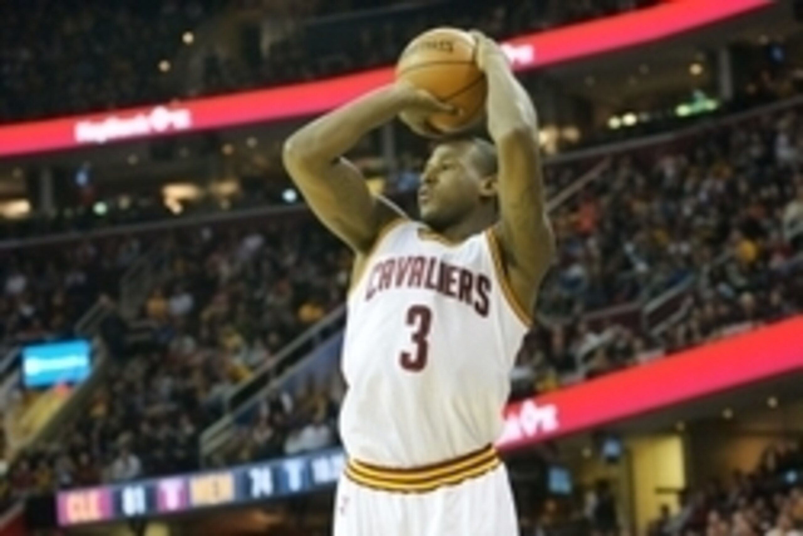 Dec 21, 2014; Cleveland, OH, USA; Cleveland Cavaliers guard Dion Waiters (3) shoots a three-point basket in the fourth quarter against the Memphis Grizzlies at Quicken Loans Arena. Mandatory Credit: David Richard-USA TODAY Sports