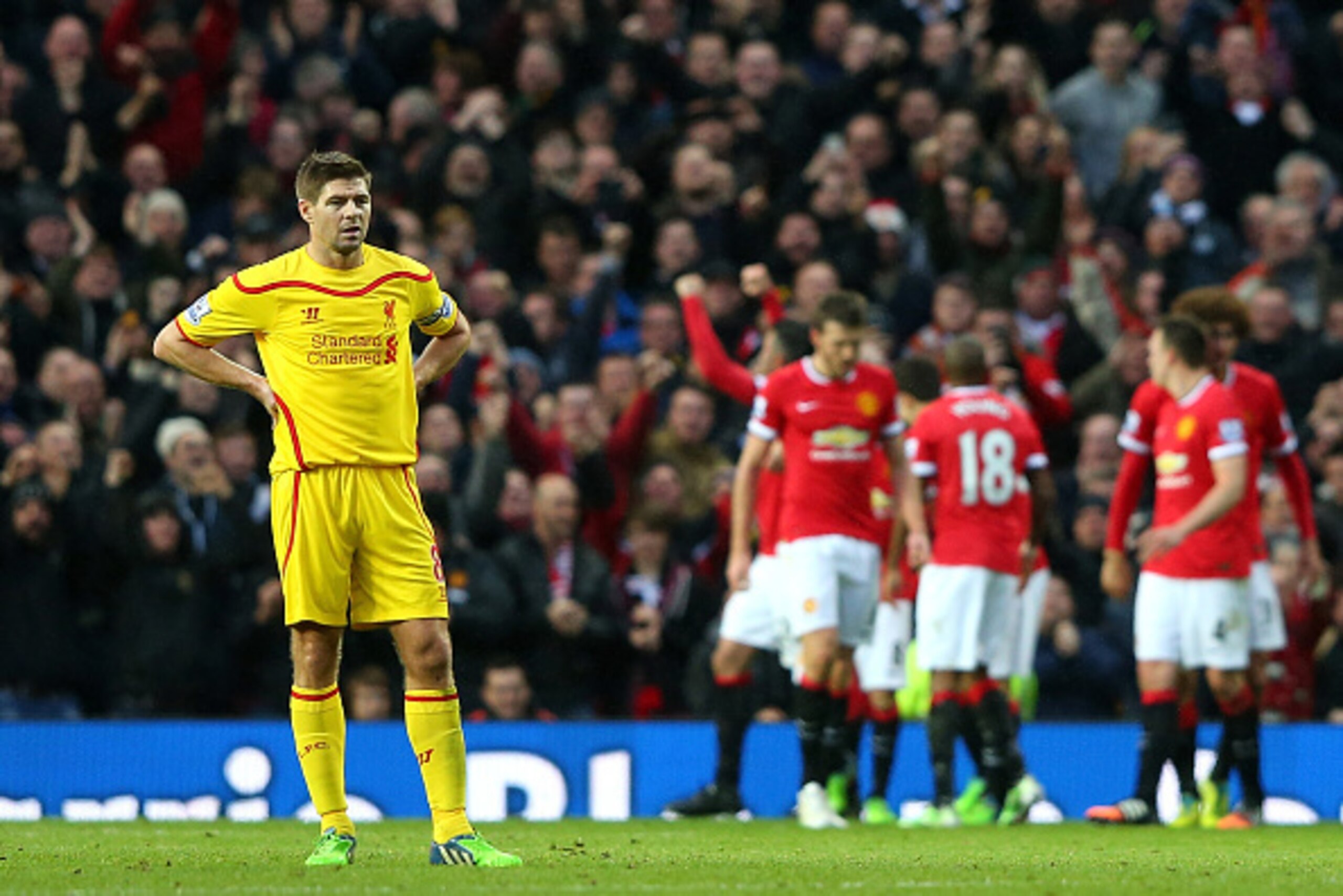 MANCHESTER, ENGLAND - DECEMBER 14:  Steven Gerrard of Liverpool looks dejected after his team conceded the third goal during the Barclays Premier League match between Manchester United and Liverpool at Old Trafford on December 14, 2014 in Manchester, Engl