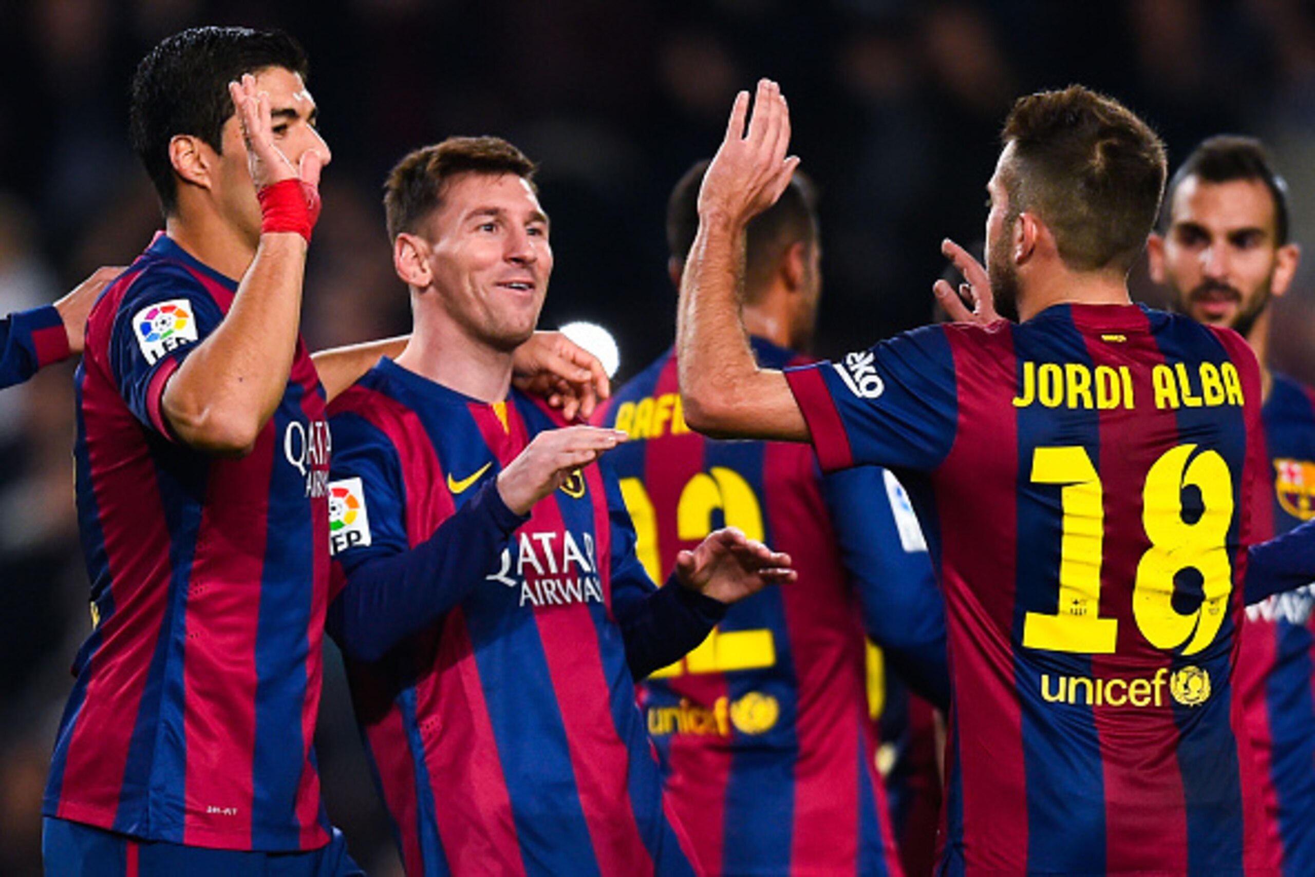 BARCELONA, SPAIN - DECEMBER 20: Lionel Messi of FC Barcelona celebrates with his teammates after scoring his team's fifth goalduring the La Liga match between FC Barcelona and Cordoba CF at Camp Nou on December 20, 2014 in Barcelona, Spain. (Photo by Da BARCELONA, SPAIN - DECEMBER 20: Lionel Messi of FC Barcelona celebrates with his teammates after scoring his team's fifth goalduring the La Liga match between FC Barcelona and Cordoba CF at Camp Nou on December 20, 2014 in Barcelona, Spain. (Photo by Da