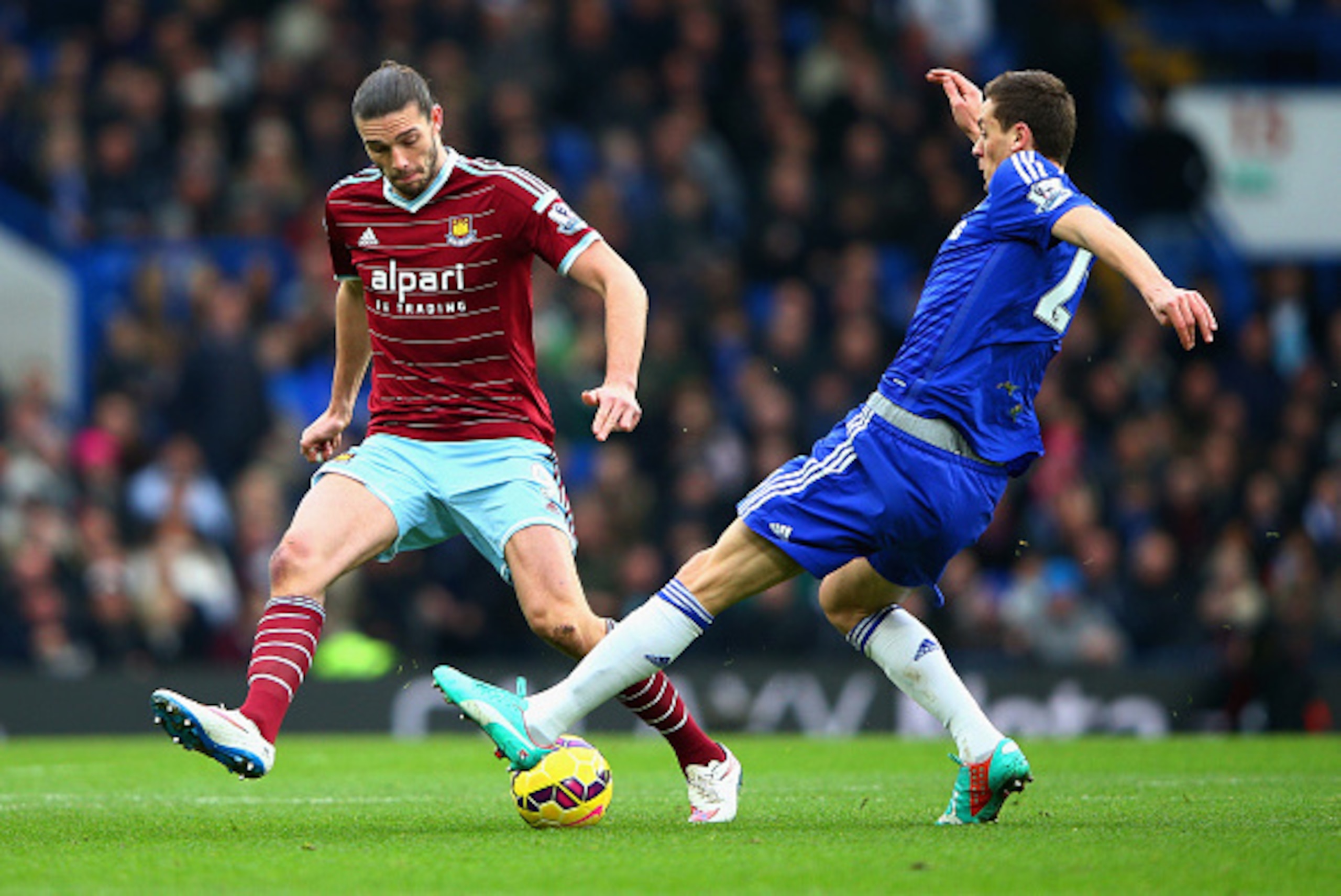 LONDON, ENGLAND - DECEMBER 26: Andy Carroll of West Ham is tackled by Nemanja Matic of Chelsea during the Barclays Premier League match between Chelsea and West Ham United at Stamford Bridge on December 26, 2014 in London, England. (Photo by Ian Walton/ LONDON, ENGLAND - DECEMBER 26: Andy Carroll of West Ham is tackled by Nemanja Matic of Chelsea during the Barclays Premier League match between Chelsea and West Ham United at Stamford Bridge on December 26, 2014 in London, England. (Photo by Ian Walton/