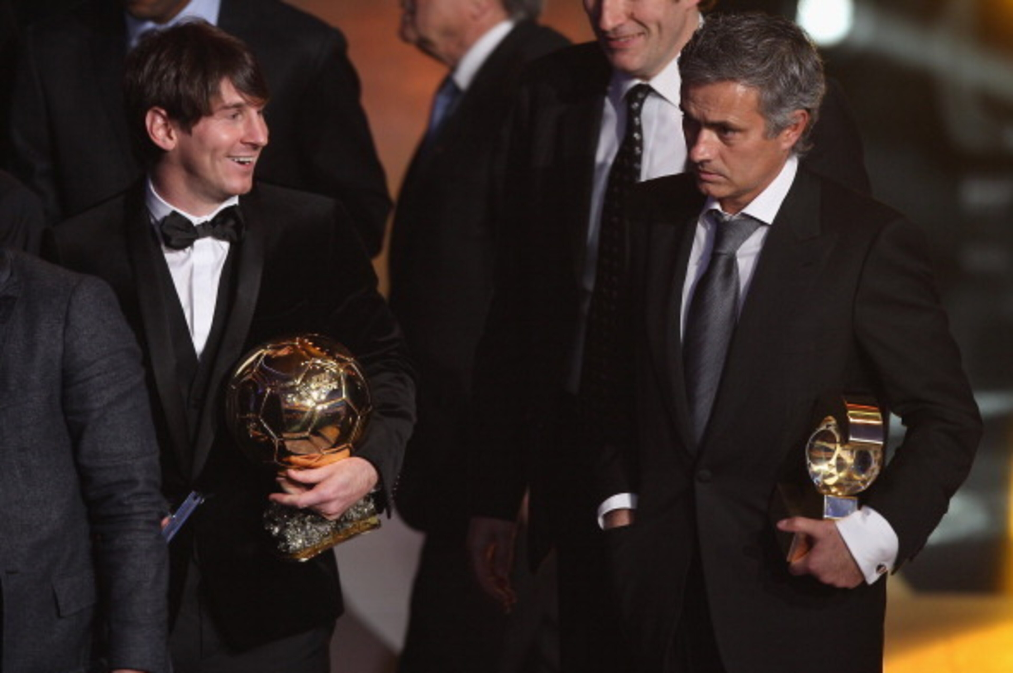 ZURICH, SWITZERLAND - JANUARY 10: Lionel Messi (l) of Argentina and Barcelona FC winner of the men's player of the year alongside Jose Mourinho (r) of Portugal and Real Madrid FC winner of coach of the yea award during the FIFA Ballon d'or Gala at the Zu ZURICH, SWITZERLAND - JANUARY 10: Lionel Messi (l) of Argentina and Barcelona FC winner of the men's player of the year alongside Jose Mourinho (r) of Portugal and Real Madrid FC winner of coach of the yea award during the FIFA Ballon d'or Gala at the Zu