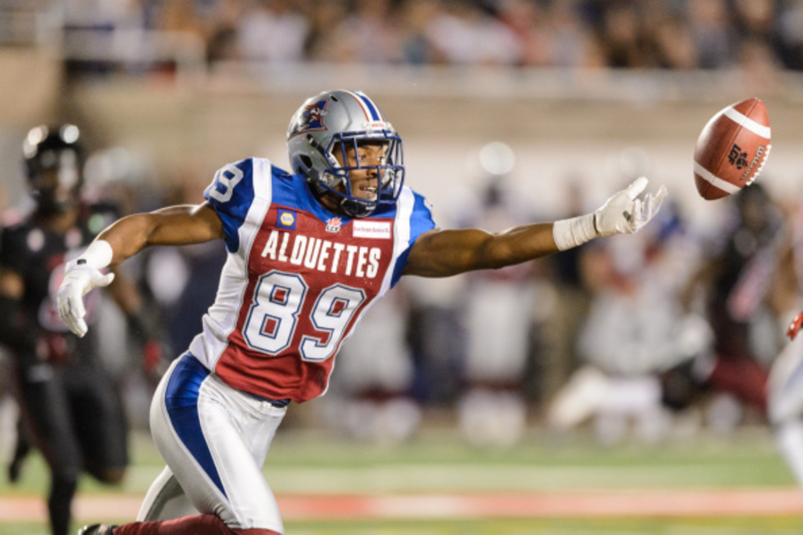 MONTREAL, QC - AUGUST 29: Duron Carter #89 of the Montreal Alouettes misses a pass during the CFL game against the Ottawa Redblacks at Percival Molson Stadium on August 29, 2014 in Montreal, Quebec, Canada. The Alouettes defeated the Redblacks 20-10. (Ph MONTREAL, QC - AUGUST 29: Duron Carter #89 of the Montreal Alouettes misses a pass during the CFL game against the Ottawa Redblacks at Percival Molson Stadium on August 29, 2014 in Montreal, Quebec, Canada. The Alouettes defeated the Redblacks 20-10. (Ph