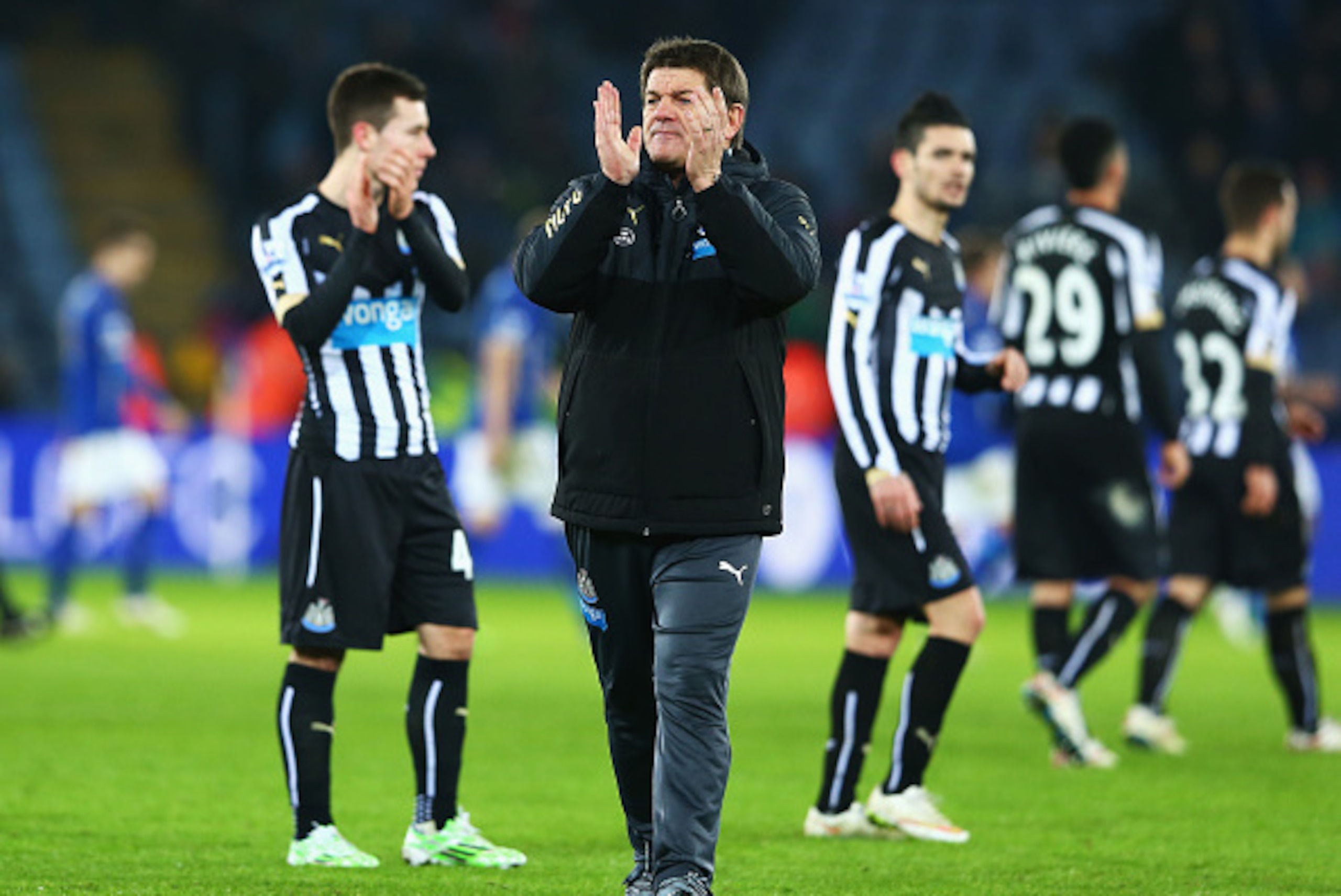 LEICESTER, ENGLAND - JANUARY 03:  John Carver, joint caretaker manager of Newcastle United applauds the fans after the FA Cup Third Round match between Leicester City and Newcastle United at The King Power Stadium on January 3, 2015 in Leicester, England.