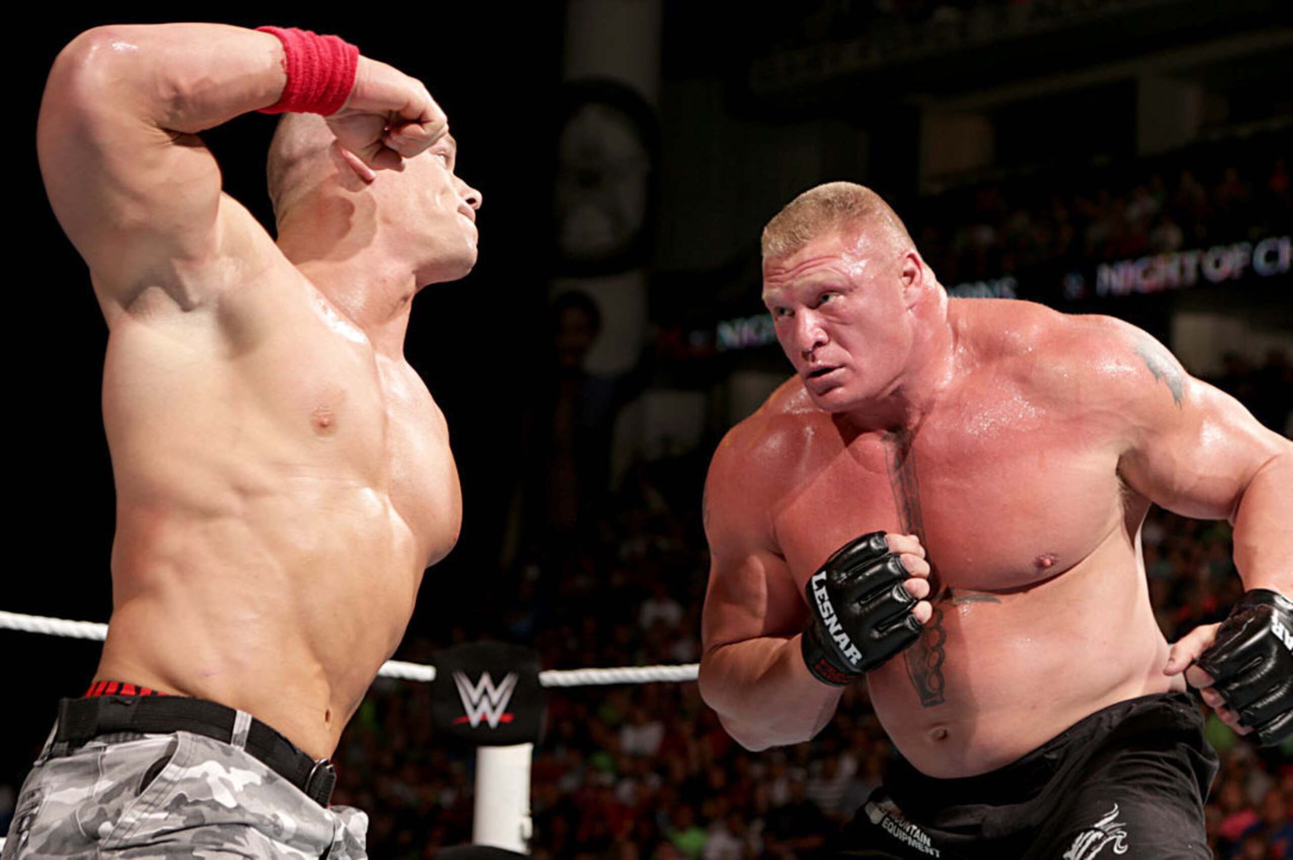 John Cena and Brock Lesnar battle at Night of Champions. John Cena and Brock Lesnar battle at Night of Champions.