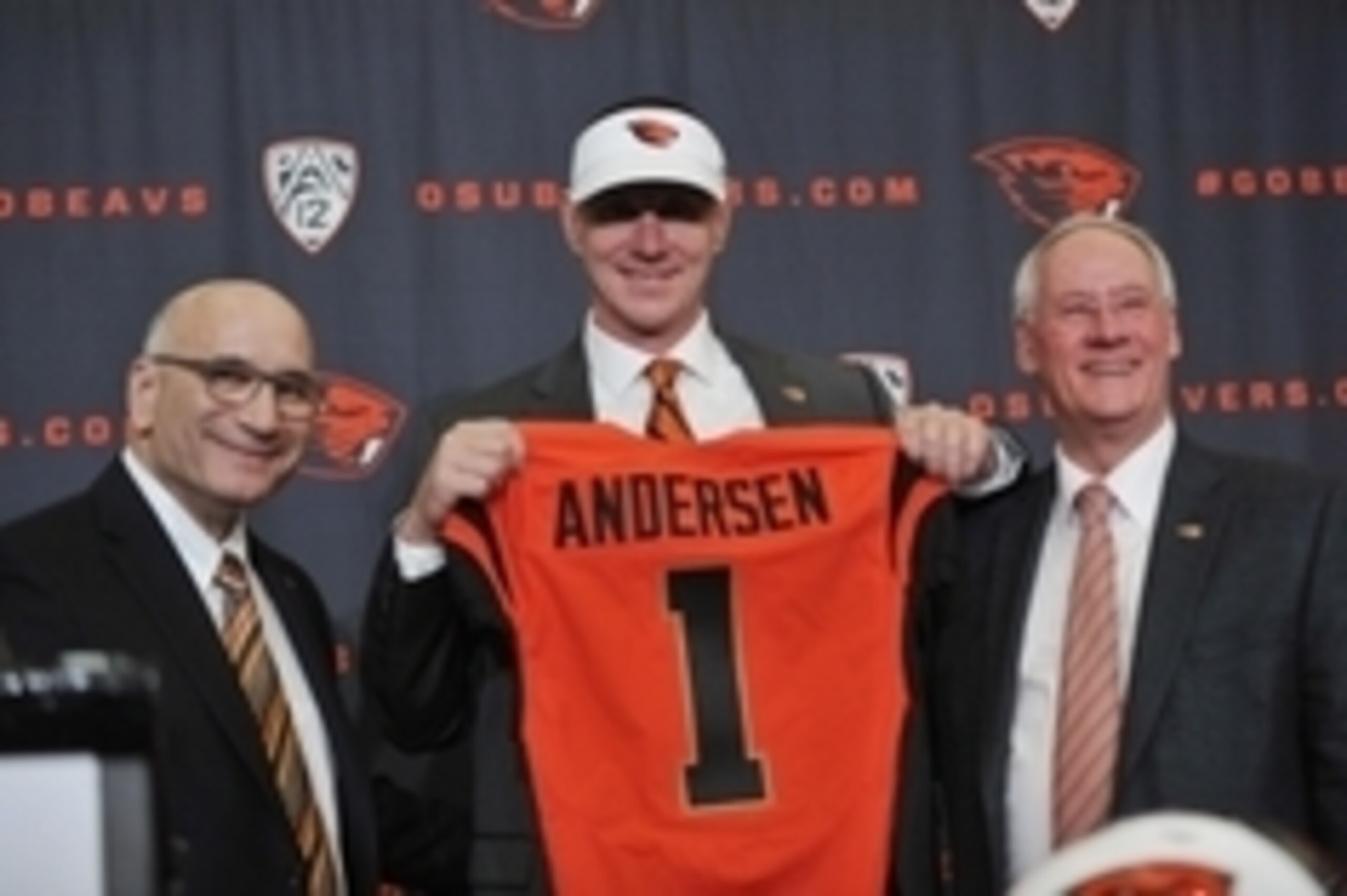 Nov 15, 2014; Corvallis, OR, USA; Oregon State Beavers new football coach Gary Andersen (center) poses for a photo with athletic director Bob De Carolis (left) and president Edward Ray during a press conference at Reser Stadium. Mandatory Credit: Susan Ra Nov 15, 2014; Corvallis, OR, USA; Oregon State Beavers new football coach Gary Andersen (center) poses for a photo with athletic director Bob De Carolis (left) and president Edward Ray during a press conference at Reser Stadium. Mandatory Credit: Susan Ra