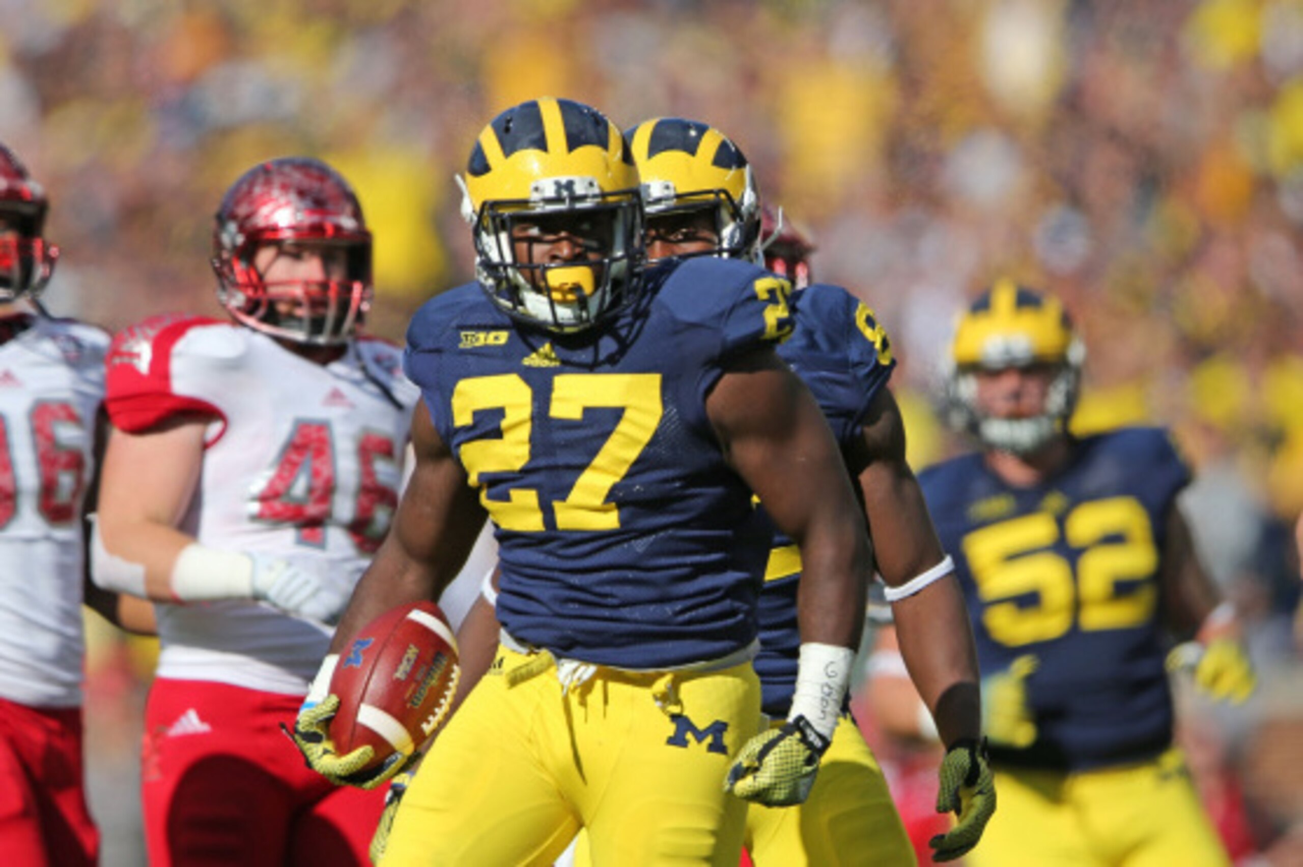 ANN ARBOR, MI - SEPTEMBER 13: Derrick Green #27 of the Michigan Wolverines scores on a one yard run during the first half of the game against Miami University Redhawks at Michigan Stadium on September 13, 2014 in Ann Arbor, Michigan. (Photo by Leon Halip ANN ARBOR, MI - SEPTEMBER 13: Derrick Green #27 of the Michigan Wolverines scores on a one yard run during the first half of the game against Miami University Redhawks at Michigan Stadium on September 13, 2014 in Ann Arbor, Michigan. (Photo by Leon Halip