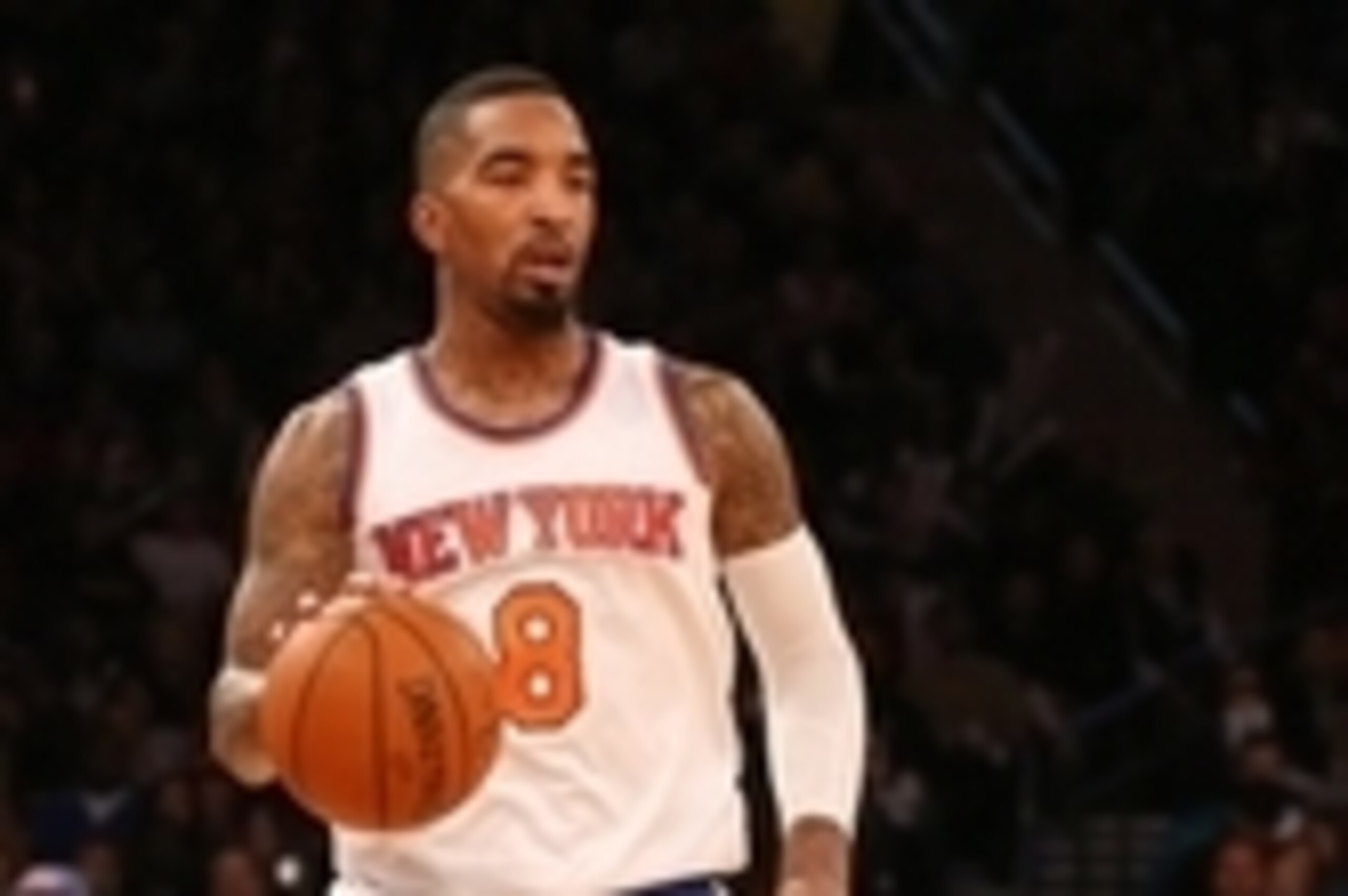 Jan 2, 2015; New York, NY, USA;  New York Knicks guard J.R. Smith (8) advances the ball during the third quarter against the Detroit Pistons at Madison Square Garden. Detroit Pistons won 97-81. Mandatory Credit: Anthony Gruppuso-USA TODAY Sports