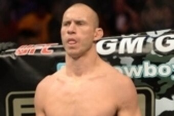 Jan 3, 2015; Las Vegas, NV, USA; Donald Cerrone (red gloves) in his lightweight bout at UFC 182 at MGM Grand Garden Arena. Mandatory Credit: Jayne Kamin-Oncea-USA TODAY Sports
