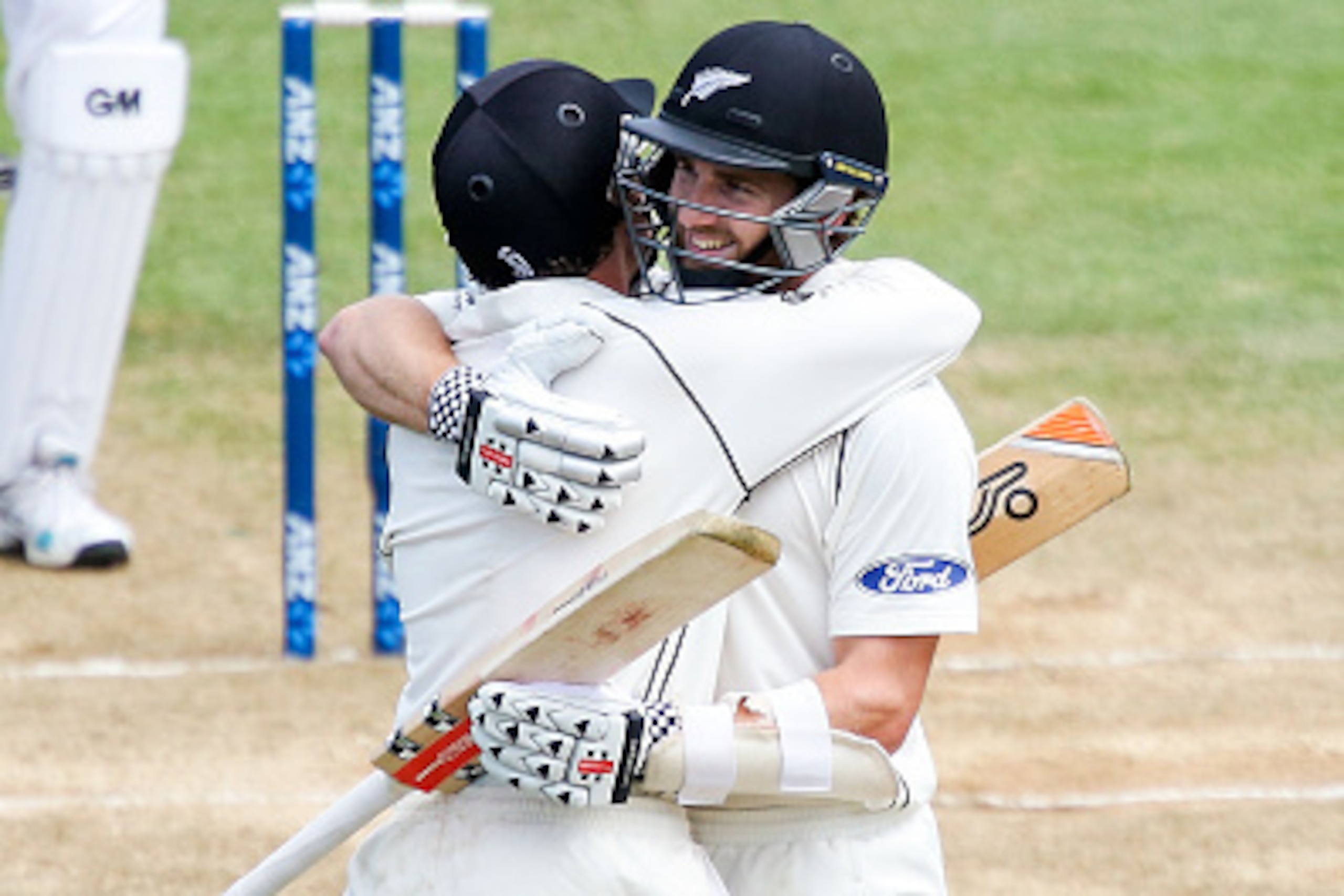 WELLINGTON, NEW ZEALAND - JANUARY 06: Kane Williamson (R) of New Zealand celebrates his double century with teammate BJ Watling during day four of the Second Test match between New Zealand and Sri Lanka at Basin Reserve on January 6, 2015 in Wellington, WELLINGTON, NEW ZEALAND - JANUARY 06: Kane Williamson (R) of New Zealand celebrates his double century with teammate BJ Watling during day four of the Second Test match between New Zealand and Sri Lanka at Basin Reserve on January 6, 2015 in Wellington,