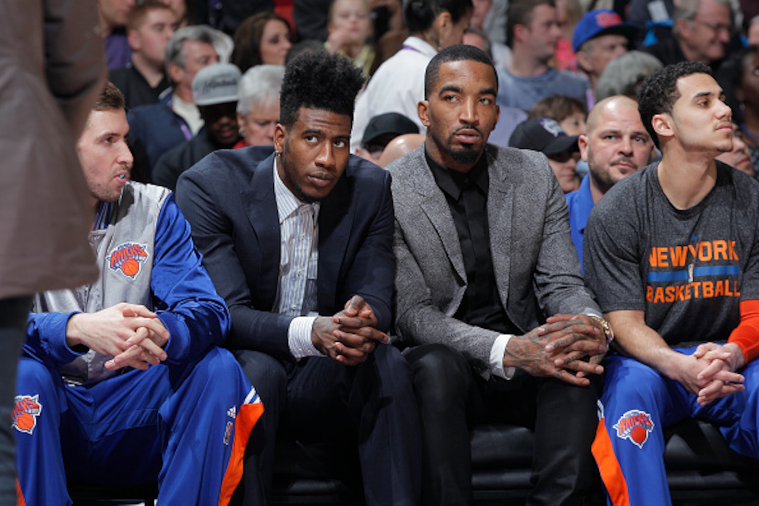 SACRAMENTO, CA - DECEMBER 27: Iman Shumpert #21 and J.R. Smith #8 of the New York Knicks inactive against the Sacramento Kings on December 27, 2014 at Sleep Train Arena in Sacramento, California. NOTE TO USER: User expressly acknowledges and agrees that, 