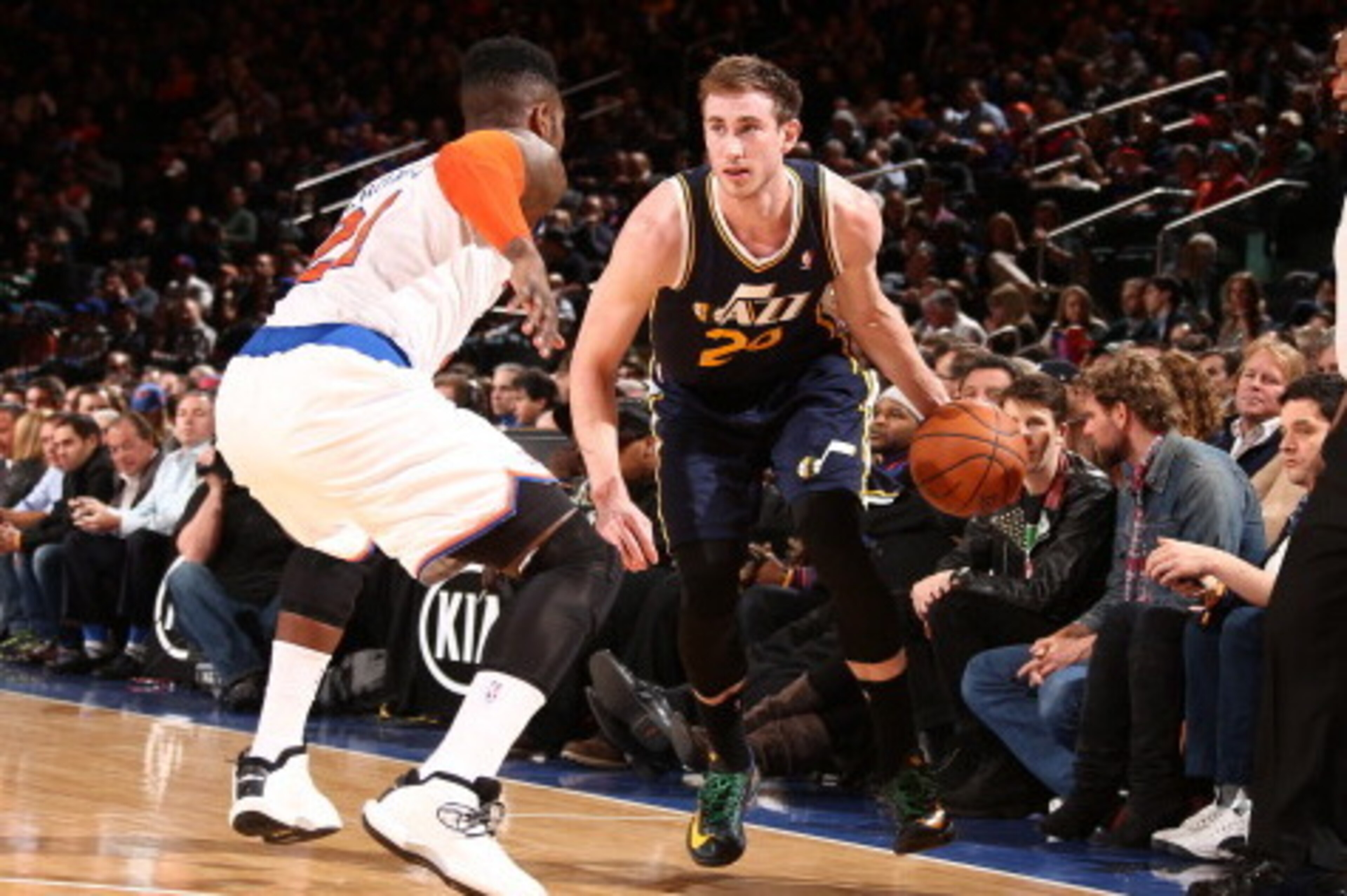 NEW YORK, NY - MARCH 7: Gordon Hayward #20 of the Utah Jazz drives against Iman Shumpert #21 of the New York Knicks during a game at Madison Square Garden in New York City on March 7, 2014.  NOTE TO USER: User expressly acknowledges and agrees that, by do