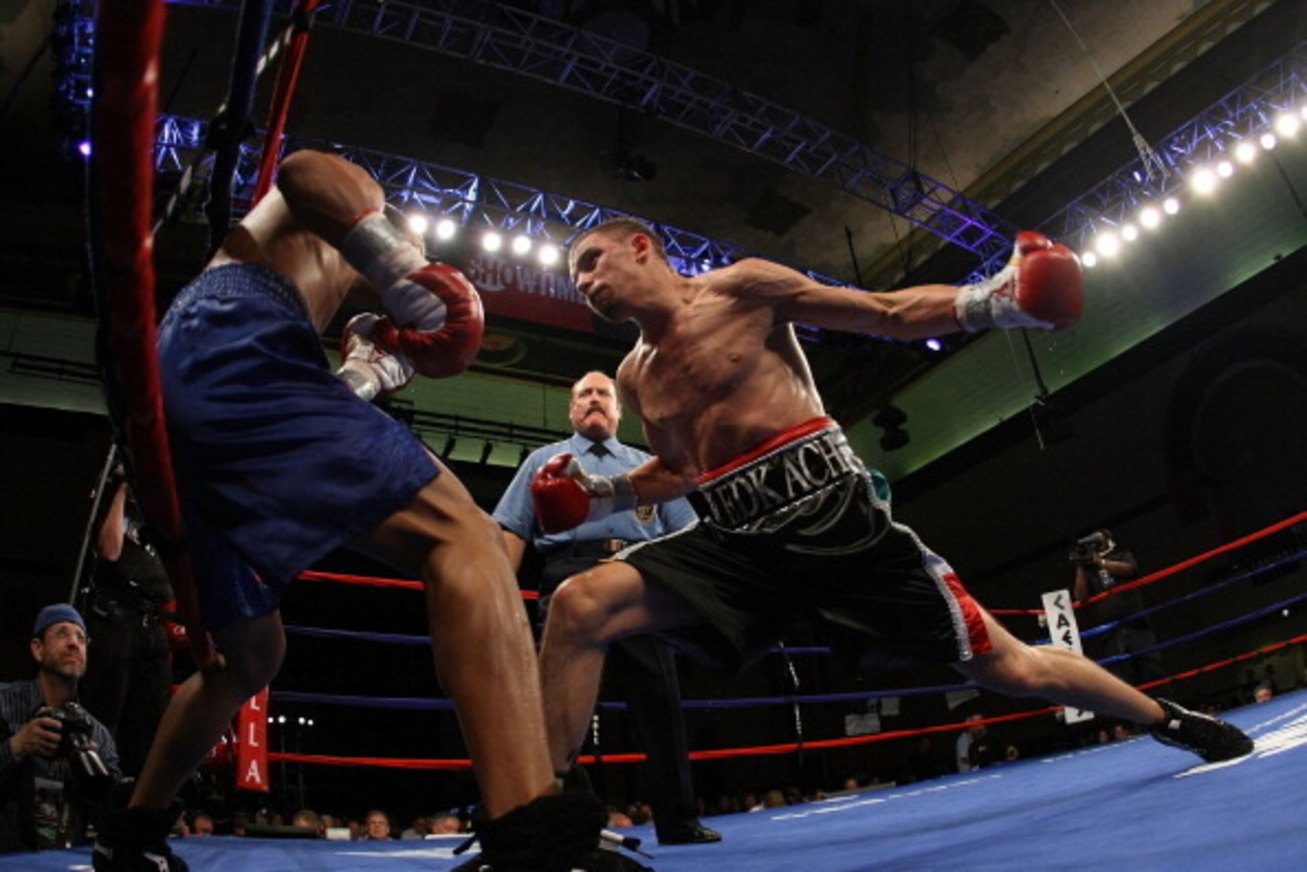ATLANTIC CITY, NJ - JUNE 04:  Ivan Redkach punches Alberto Amaro during their Junior Welterweight bout at Boardwalk Hall on June 4, 2011 in Atlantic City, New Jersey.  (Photo by Al Bello/Getty Images)