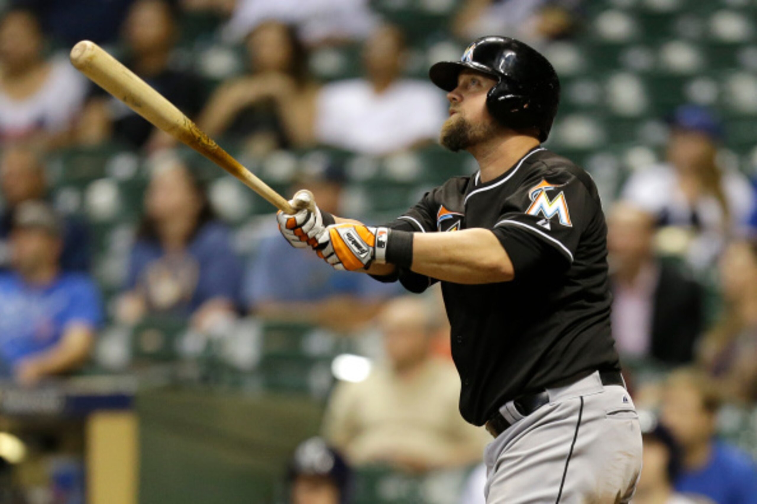 MILWAUKEE, WI - SEPTEMBER 09:  Casey McGehee #9 of the Miami Marlins hits a two-run homer in the top of the ninth inning against the Milwaukee Brewers at Miller Park on September 09, 2014 in Milwaukee, Wisconsin. (Photo by Mike McGinnis/Getty Images)