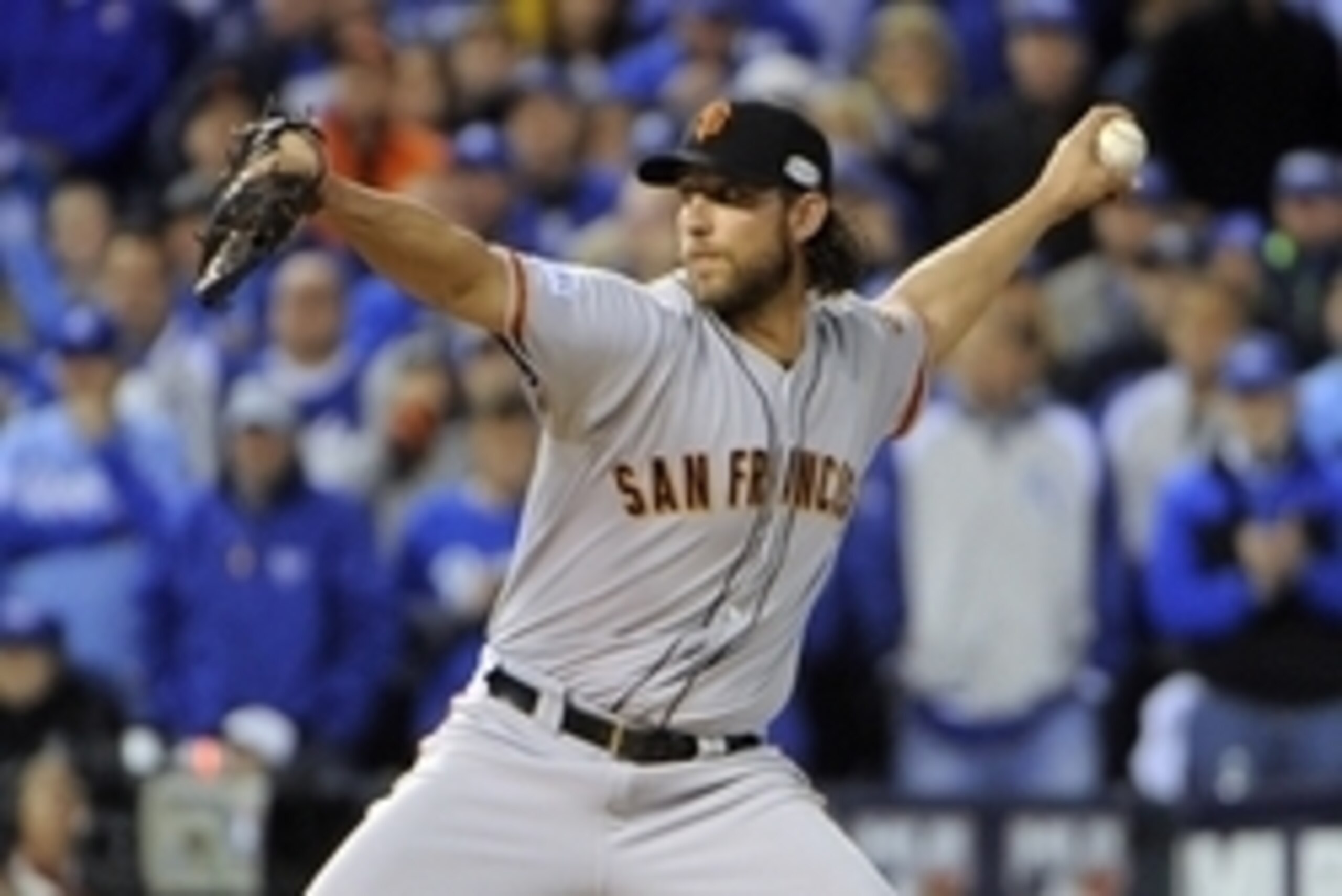 Oct 29, 2014; Kansas City, MO, USA; San Francisco Giants pitcher Madison Bumgarner throws a pitch against the Kansas City Royals in the fifth inning during game seven of the 2014 World Series at Kauffman Stadium. Mandatory Credit: John Rieger-USA TODAY Sp