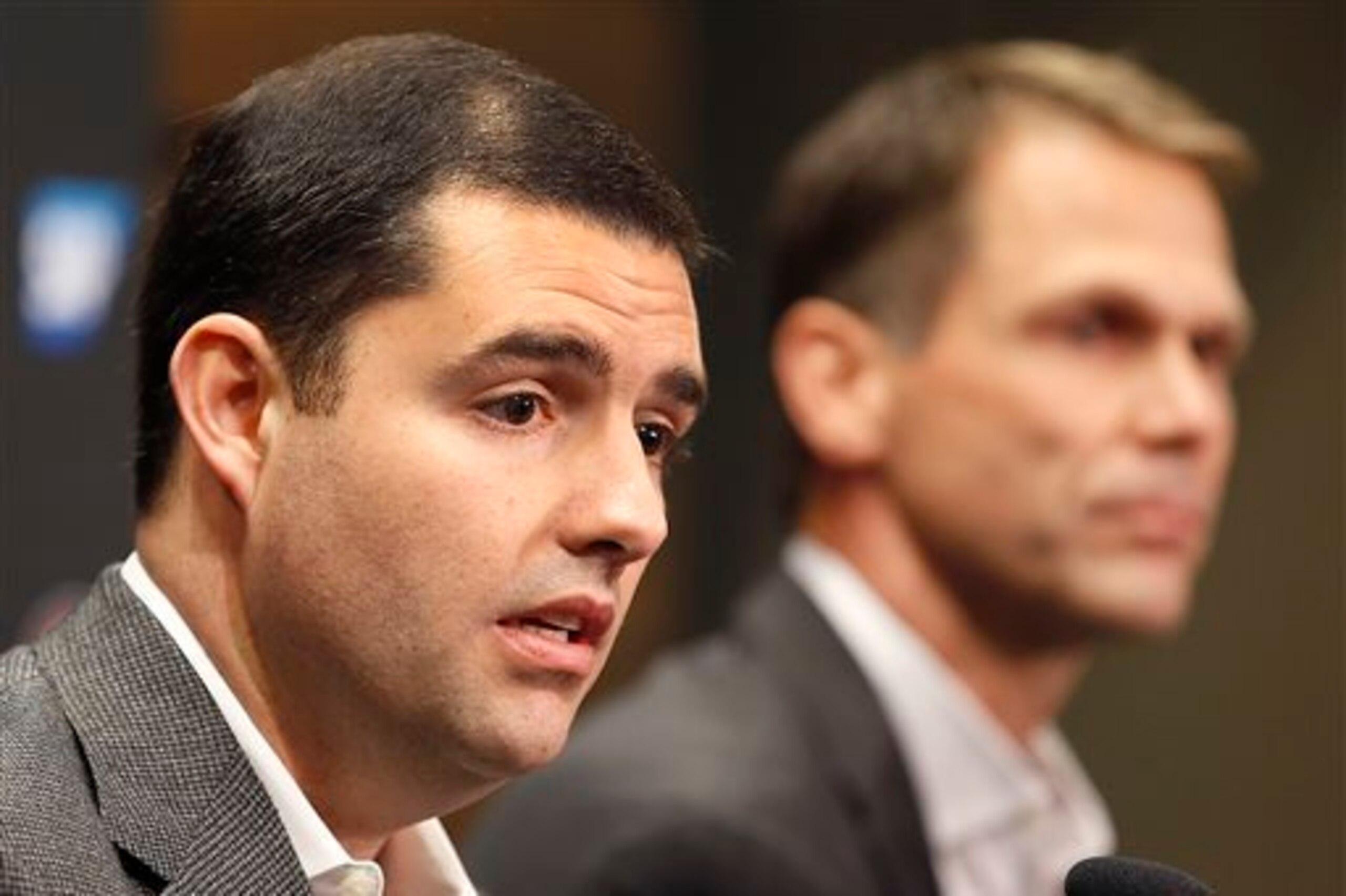 Niners' CEO Jed York (left) and general manager Trent Baalke must correct their own franchise-altering mistakes by managing the salary cap to perfection.