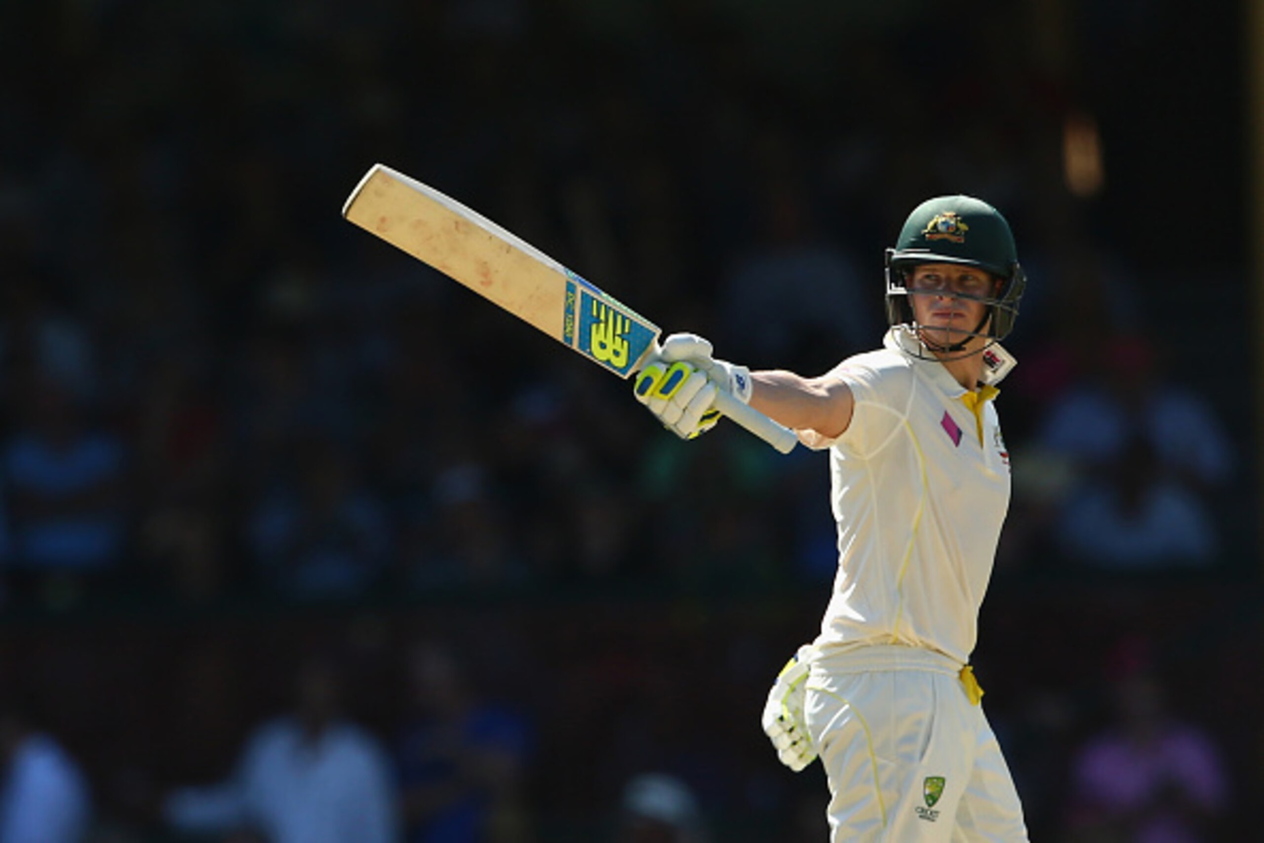 SYDNEY, AUSTRALIA - JANUARY 06:  Steve Smith of Australia celebrates after reaching his half century during day one of the Fourth Test match between Australia and India at Sydney Cricket Ground on January 6, 2015 in Sydney, Australia.  (Photo by Mark Kolb