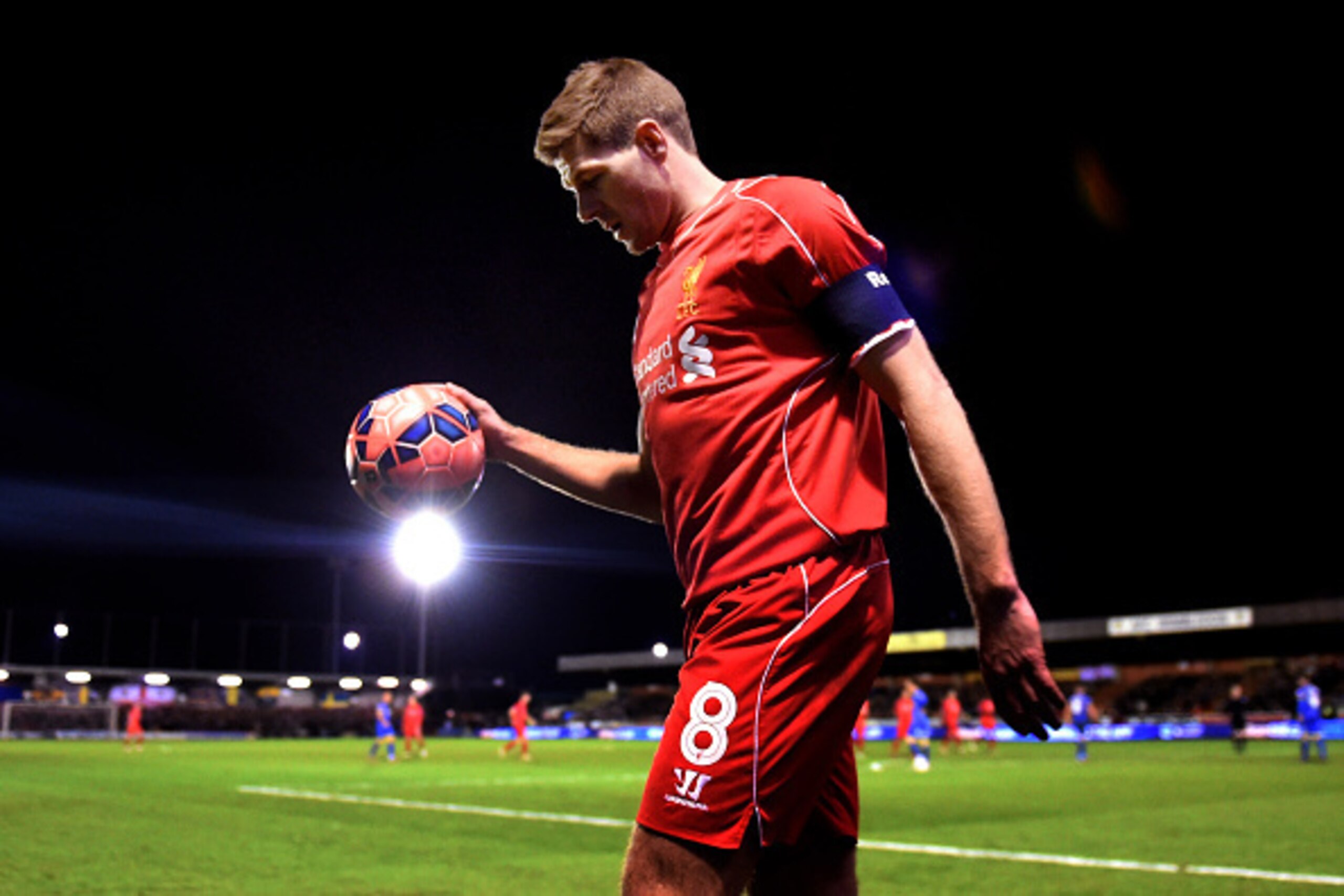 KINGSTON UPON THAMES, ENGLAND - JANUARY 05:  Steven Gerrard of Liverpool prepares to take a corner during the FA Cup Third Round match between AFC Wimbledon and Liverpool at The Cherry Red Records Stadium on January 5, 2015 in Kingston upon Thames, Englan