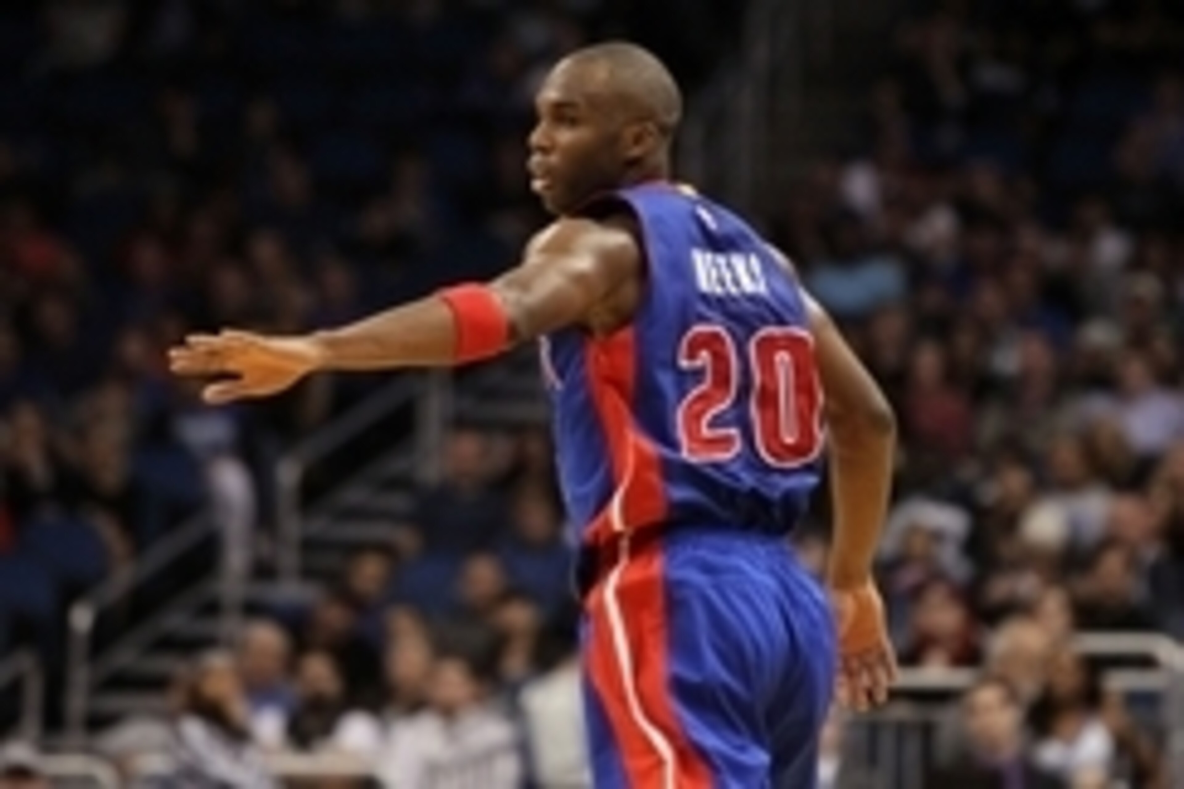 Dec 30, 2014; Orlando, FL, USA; Detroit Pistons guard Jodie Meeks (20) looks back to high five a teammate after making a three pointer against the Orlando Magic during the second quarter at Amway Center. Mandatory Credit: Kim Klement-USA TODAY Sports