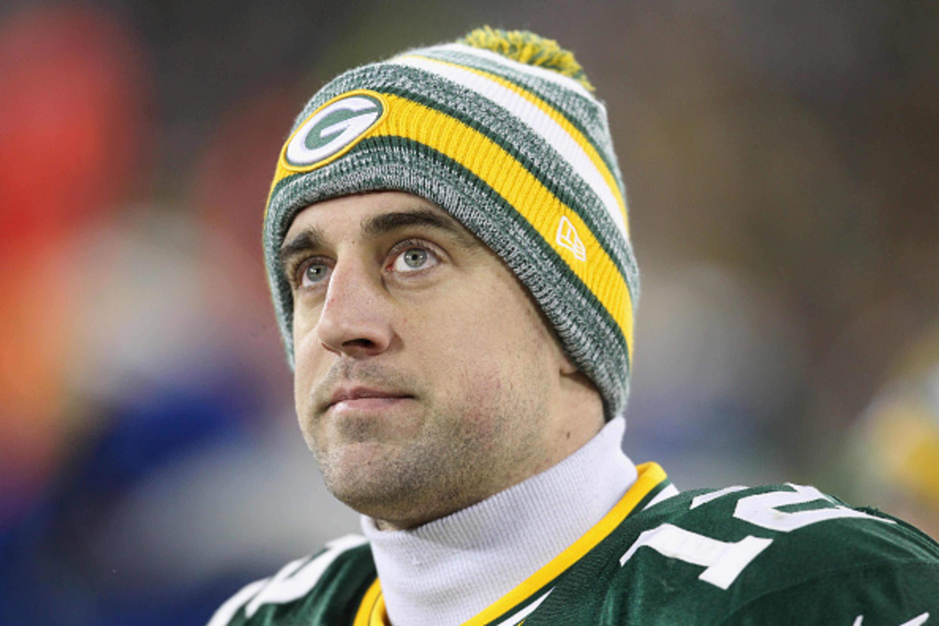 GREEN BAY, WI - DECEMBER 28:  Quarterback Aaron Rodgers #12 of the Green Bay Packers looks on during the NFL game against the Detroit Lions at Lambeau Field on December 28, 2014 in Green Bay, Wisconsin. The Green Bay Packers defeat the Detroit Lions 30-20
