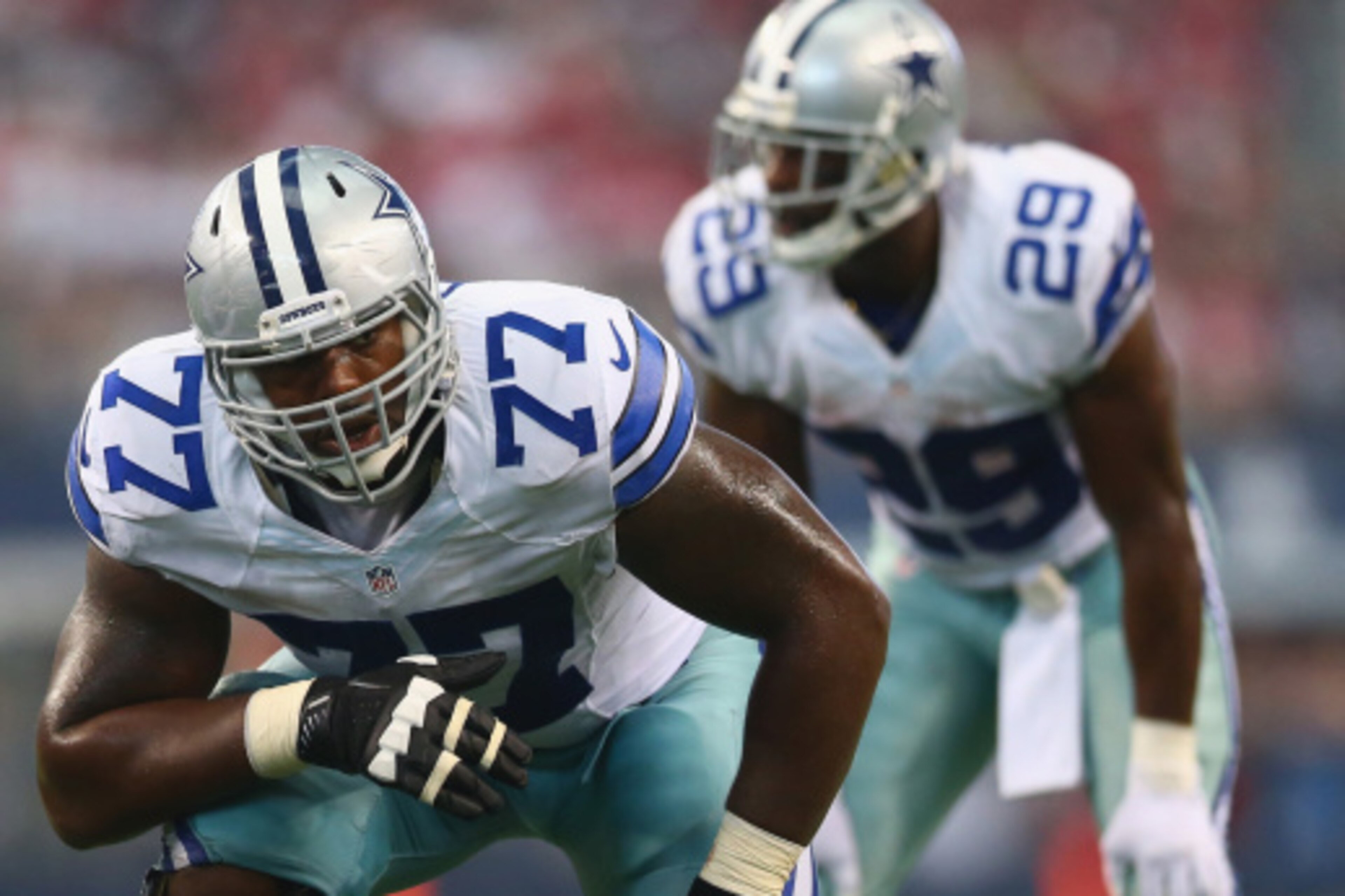 ARLINGTON, TX - SEPTEMBER 07:   Tyron Smith #77 of the Dallas Cowboys at AT&T Stadium on September 7, 2014 in Arlington, Texas.  (Photo by Ronald Martinez/Getty Images)
