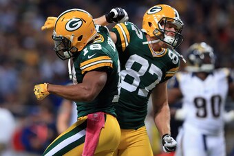 ST LOUIS, MO - OCTOBER 21:  Wide receiver Randall Cobb #18 of the Green Bay Packers celebrates his 39 yard touchdown reception against the St. Louis Rams with wide receiver Jordy Nelson #87 of the Green Bay Packers in the fourth quarter at Edward Jones Do