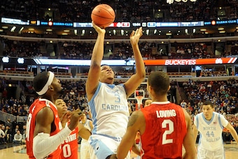 CHICAGO, IL - DECEMBER 20:  Kennedy Meeks #3 of the North Carolina Tar Heels shoots over Marc Loving #2 of the Ohio State Buckeyes during the second half of the CBS Sports Classic on December 20, 2014 at the United Center in Chicago, Illinois.  (Photo by 