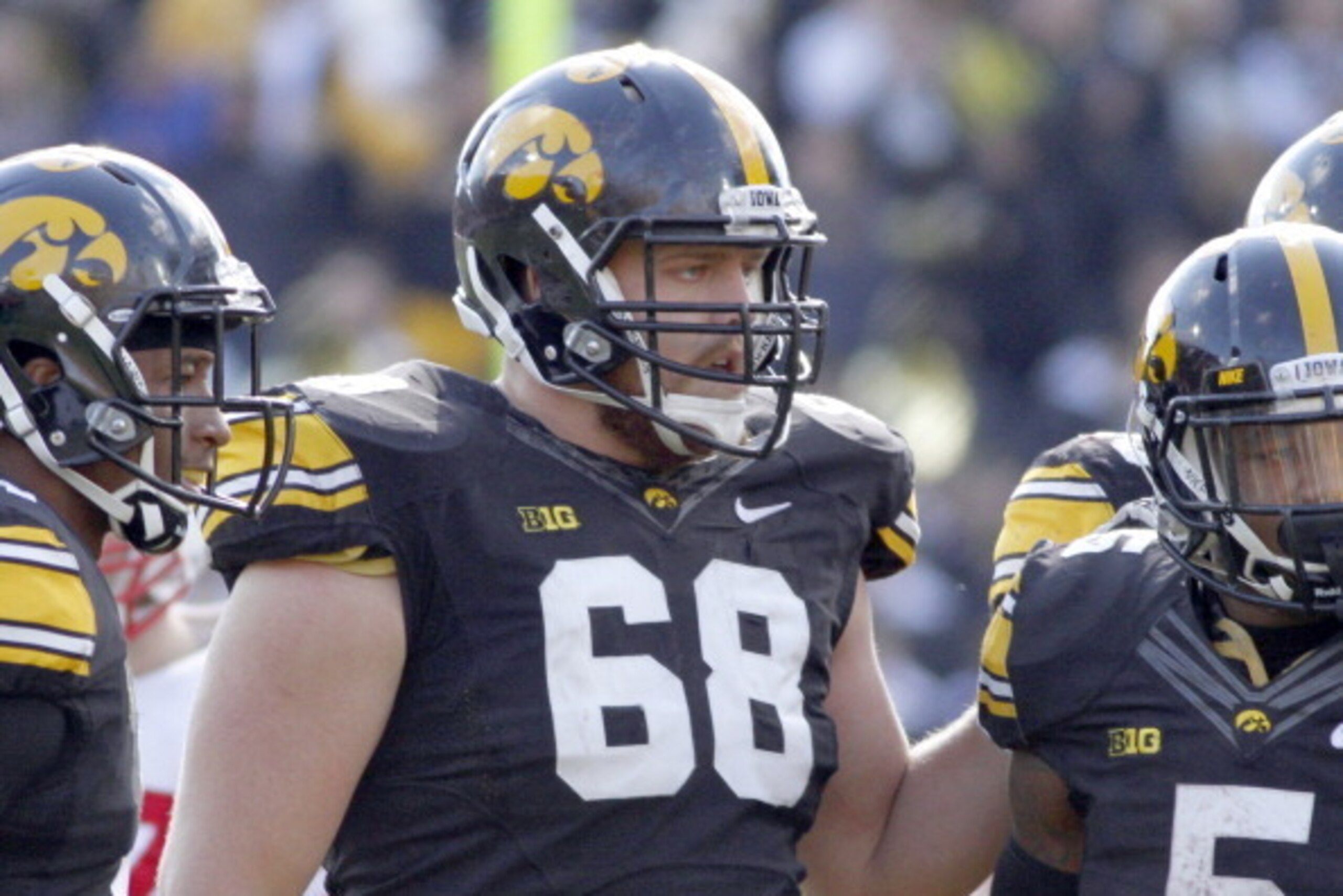 IOWA CITY, IA - NOVEMBER 2:  Offensive lineman Brandon Scherff #68 of the Iowa Hawkeyes during a break in the action in the third quarter against the Wisconsin Badgers on November 2, 2013 at Kinnick Stadium in Iowa City, Iowa. Wisconsin won 28-9. (Photo b