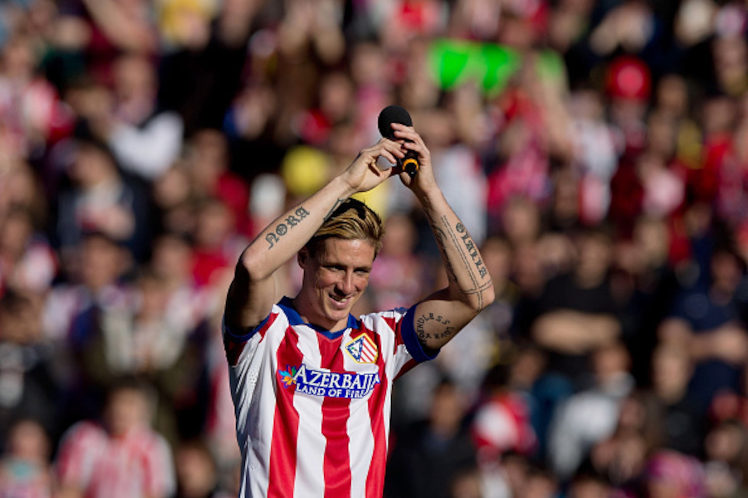 MADRID, SPAIN - JANUARY 04:  Fernando Torres attends his presentation as the new Club Atletico de Madrid signing at Vicente Calderon Stadium on January 4, 2015 in Madrid, Spain.  (Photo by Gonzalo Arroyo Moreno/Getty Images)