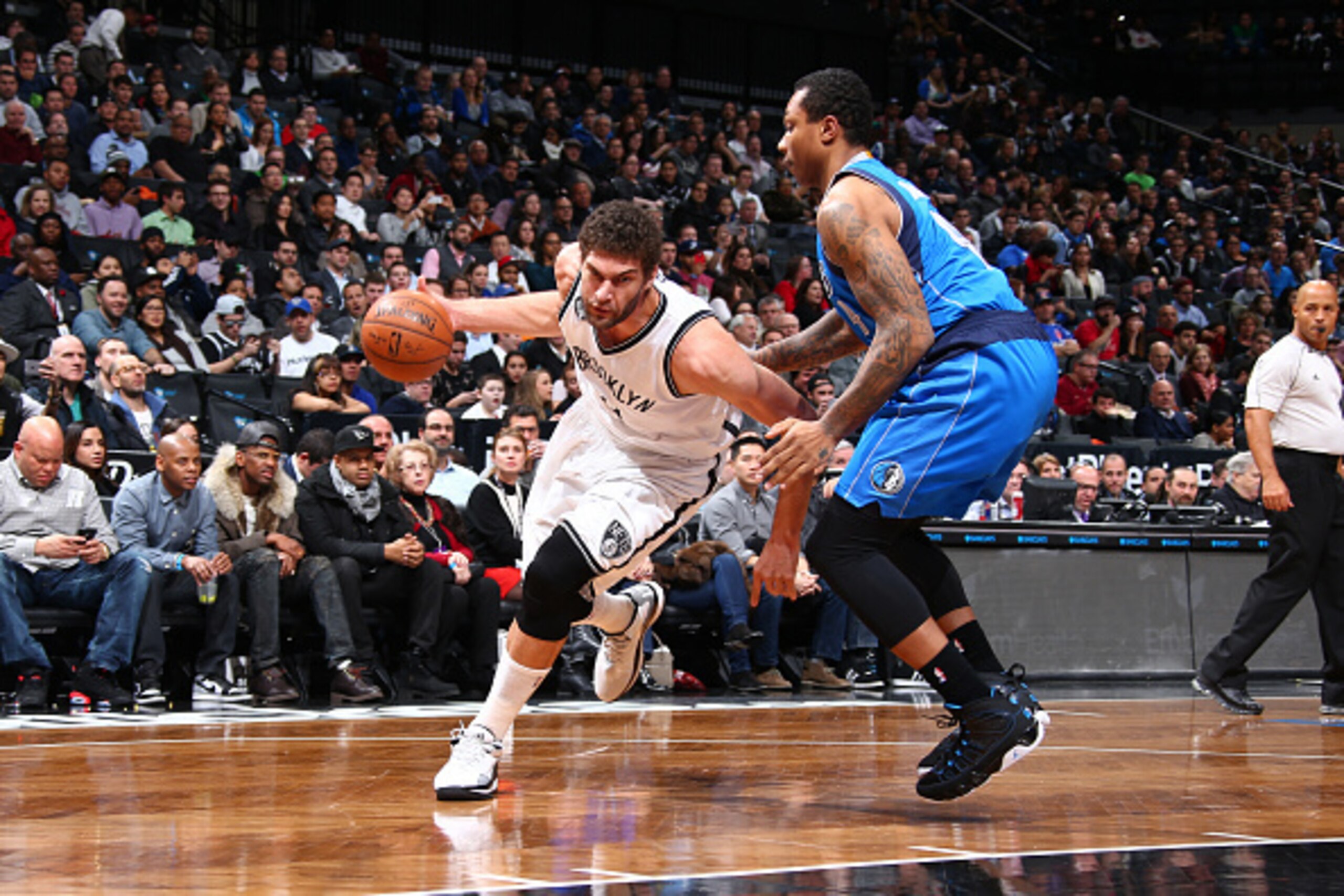 BROOKLYN, NY - JANUARY 5:  Brook Lopez #11 of the Brooklyn Nets handles the ball against the Dallas Mavericks during the game on January 5, 2015 at Barclays Center in Brooklyn, New York. NOTE TO USER: User expressly acknowledges and agrees that, by downlo