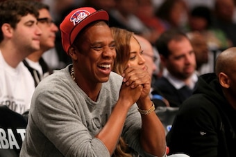 NEW YORK, NY - MAY 02:  Jay-Z and Beyonce attend Game Six of the Eastern Conference Quarterfinals during the 2014 NBA Playoffs at the Barclays Center on May 2, 2014 in the Brooklyn borough of New York City. NOTE TO USER: User expressly acknowledges and ag