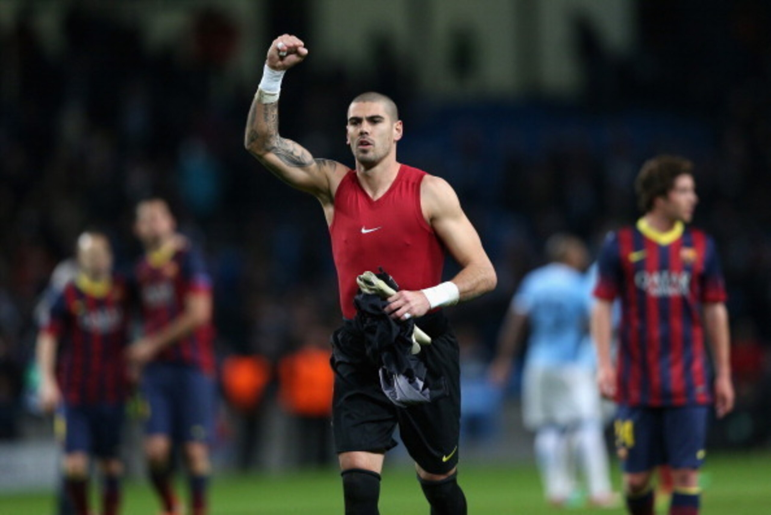 MANCHESTER, ENGLAND - FEBRUARY 18:  Victor Valdes of Barcelona celebrates at the end of the UEFA Champions League Round of 16 first leg match between Manchester City and Barcelona at the Etihad Stadium on February 18, 2014 in Manchester, England.  (Photo 