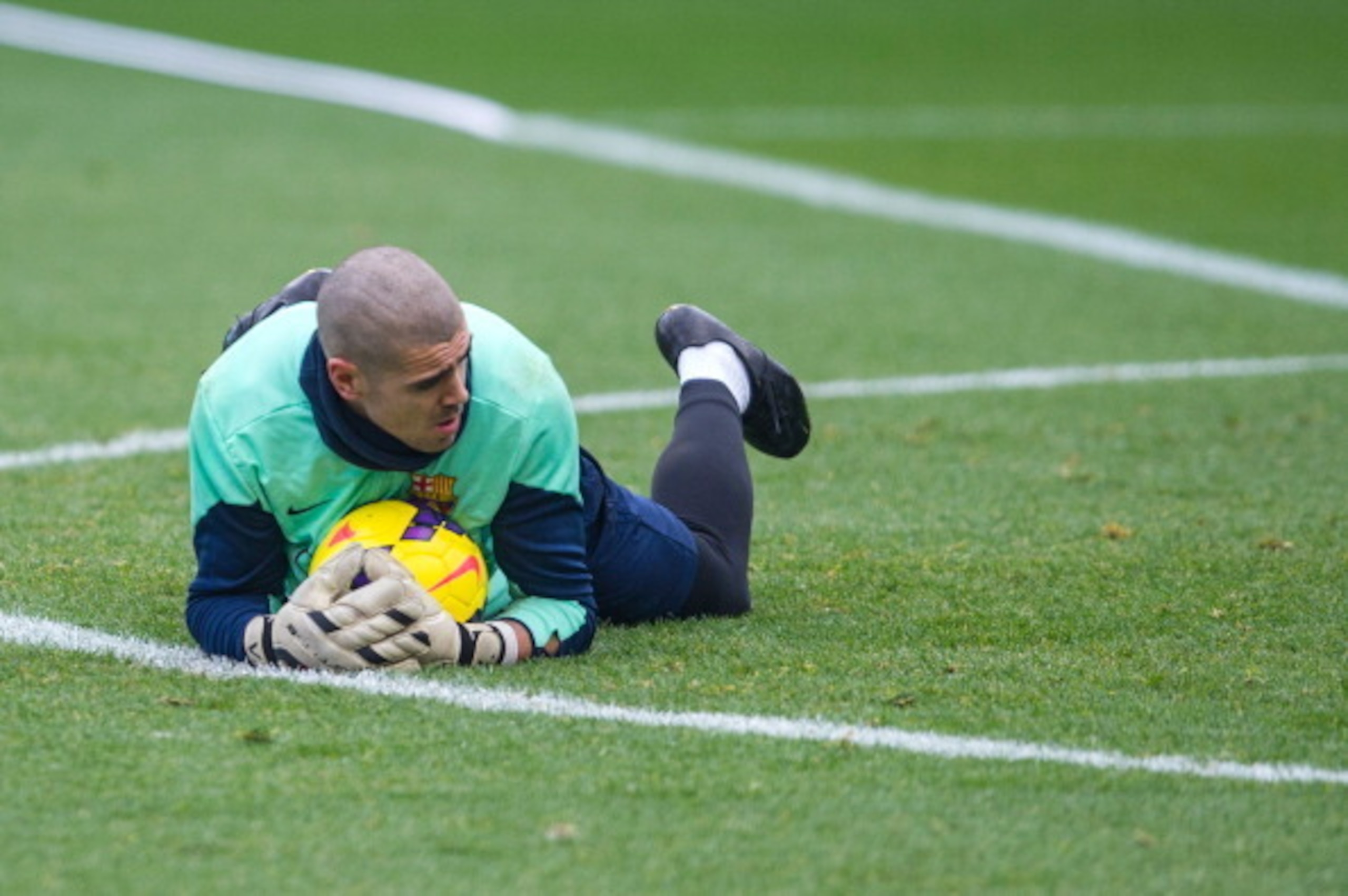 BARCELONA, SPAIN - JANUARY 03:  Victor Valdes of FC Barcelona in action during a training session at the Mini Stadi Stadium on January 3, 2014 in Barcelona, Spain.  (Photo by David Ramos/Getty Images)