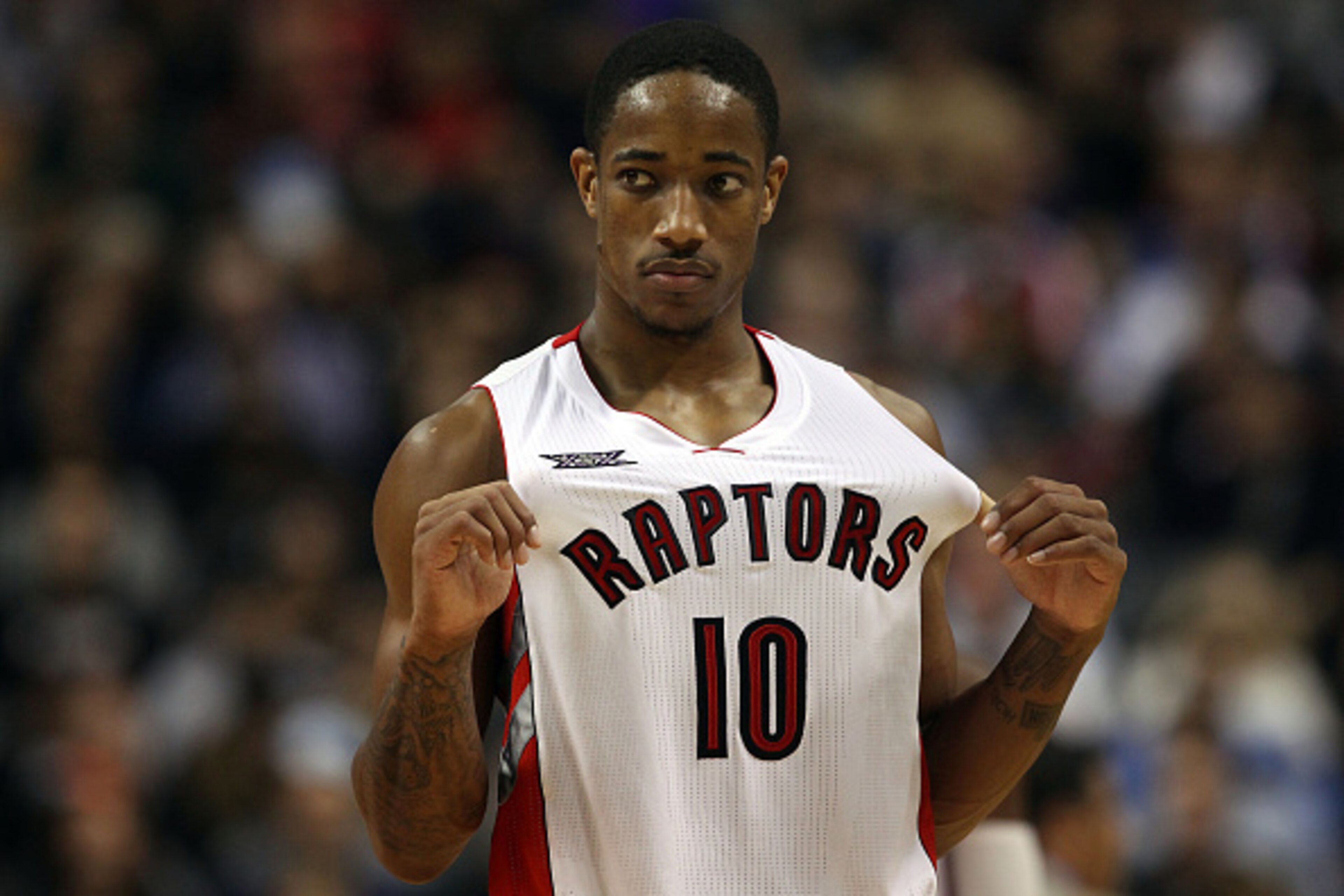 TORONTO, ON - NOVEMBER 4: DeMar DeRozan #10 of the Toronto Raptors looks on as his team faces the Oklahoma City Thunder during their game at Air Canada Centre on November 4, 2014 in Toronto, Canada. NOTE TO USER: User expressly acknowledges and agrees th TORONTO, ON - NOVEMBER 4: DeMar DeRozan #10 of the Toronto Raptors looks on as his team faces the Oklahoma City Thunder during their game at Air Canada Centre on November 4, 2014 in Toronto, Canada. NOTE TO USER: User expressly acknowledges and agrees th