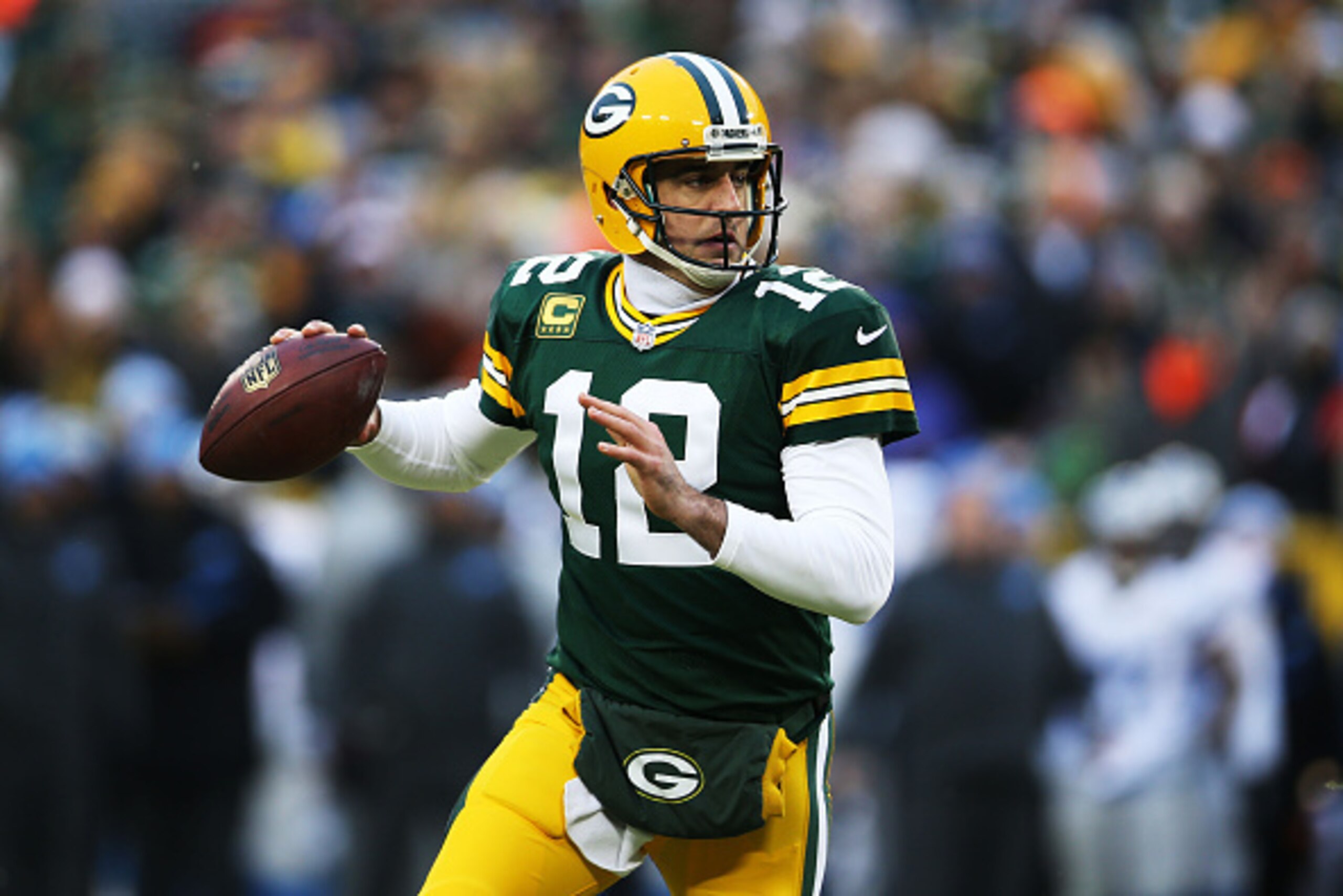 GREEN BAY, WI - DECEMBER 28: Aaron Rodgers #12 of the Green Bay Packers looks to pass against the Detroit Lions in the first quarter at Lambeau Field on December 28, 2014 in Green Bay, Wisconsin. (Photo by Chris Graythen/Getty Images) GREEN BAY, WI - DECEMBER 28: Aaron Rodgers #12 of the Green Bay Packers looks to pass against the Detroit Lions in the first quarter at Lambeau Field on December 28, 2014 in Green Bay, Wisconsin. (Photo by Chris Graythen/Getty Images)