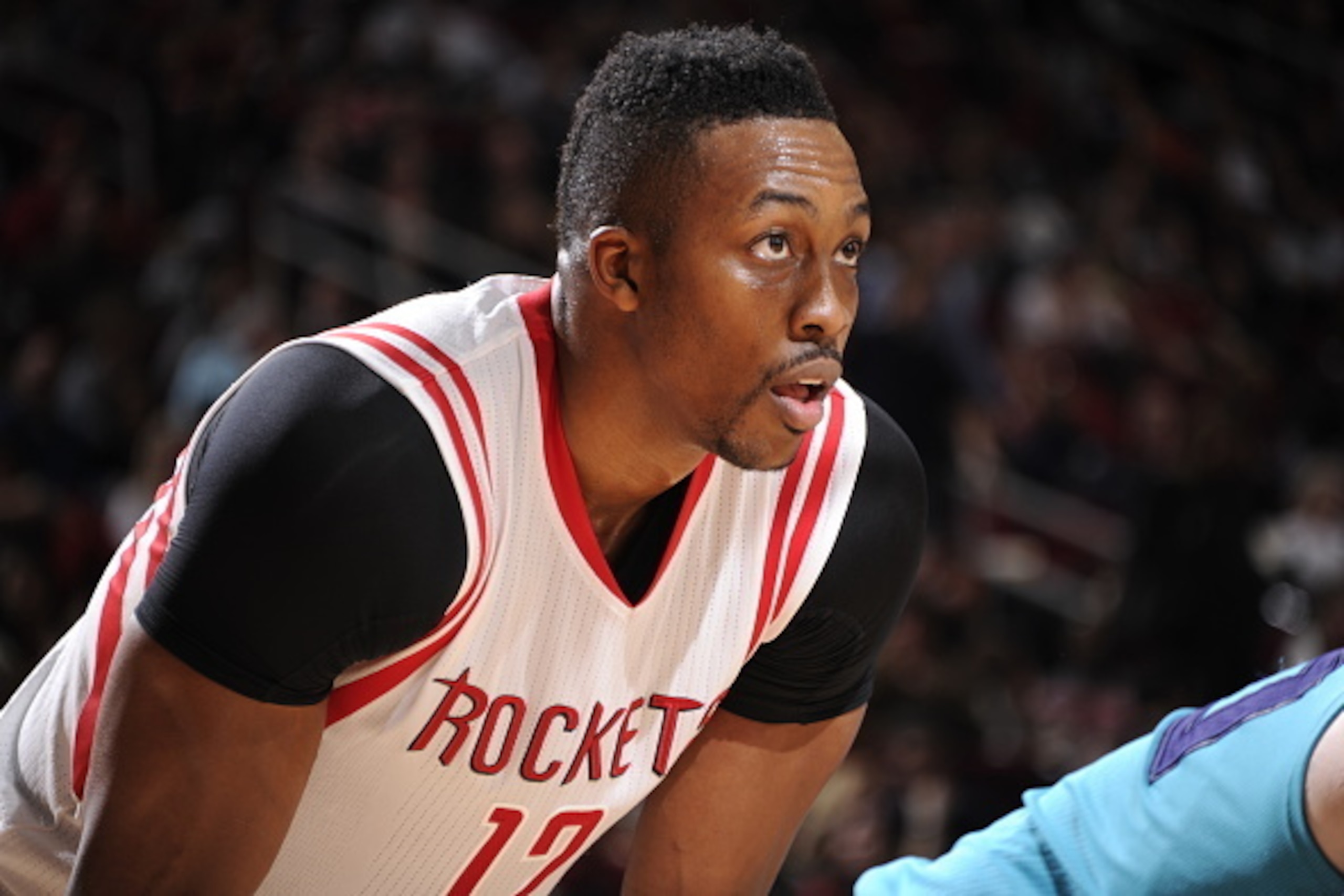 HOUSTON, TX - DECEMBER 31:  Dwight Howard #12 of the Houston Rockets during the game against the Charlotte Hornets on December 31, 2014 at the Toyota Center in Houston, Texas. NOTE TO USER: User expressly acknowledges and agrees that, by downloading and o