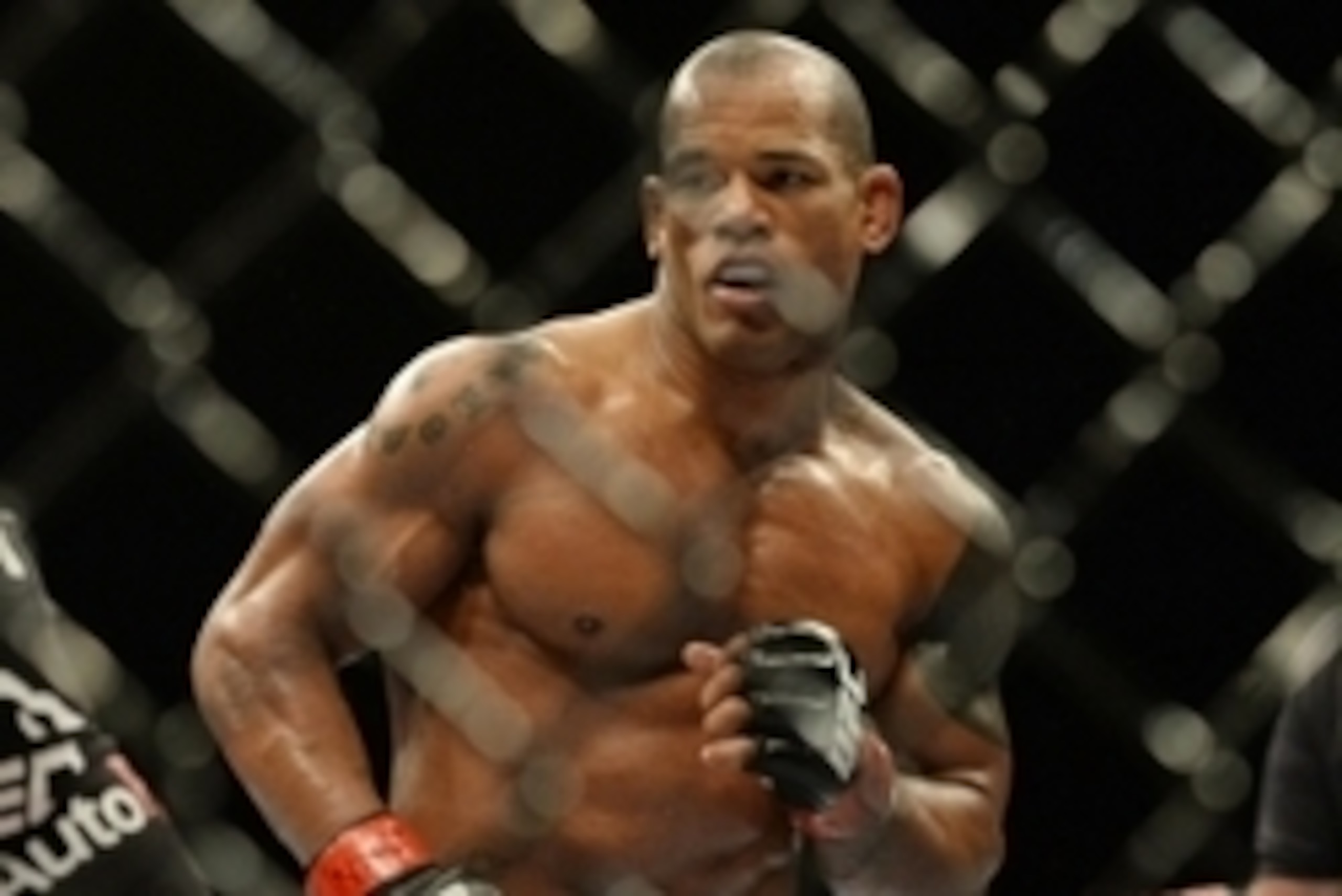 Jan 3, 2015; Las Vegas, NV, USA; Hector Lombard (red gloves) his welterweight bout at UFC 182 at MGM Grand Garden Arena. Mandatory Credit: Jayne Kamin-Oncea-USA TODAY Sports