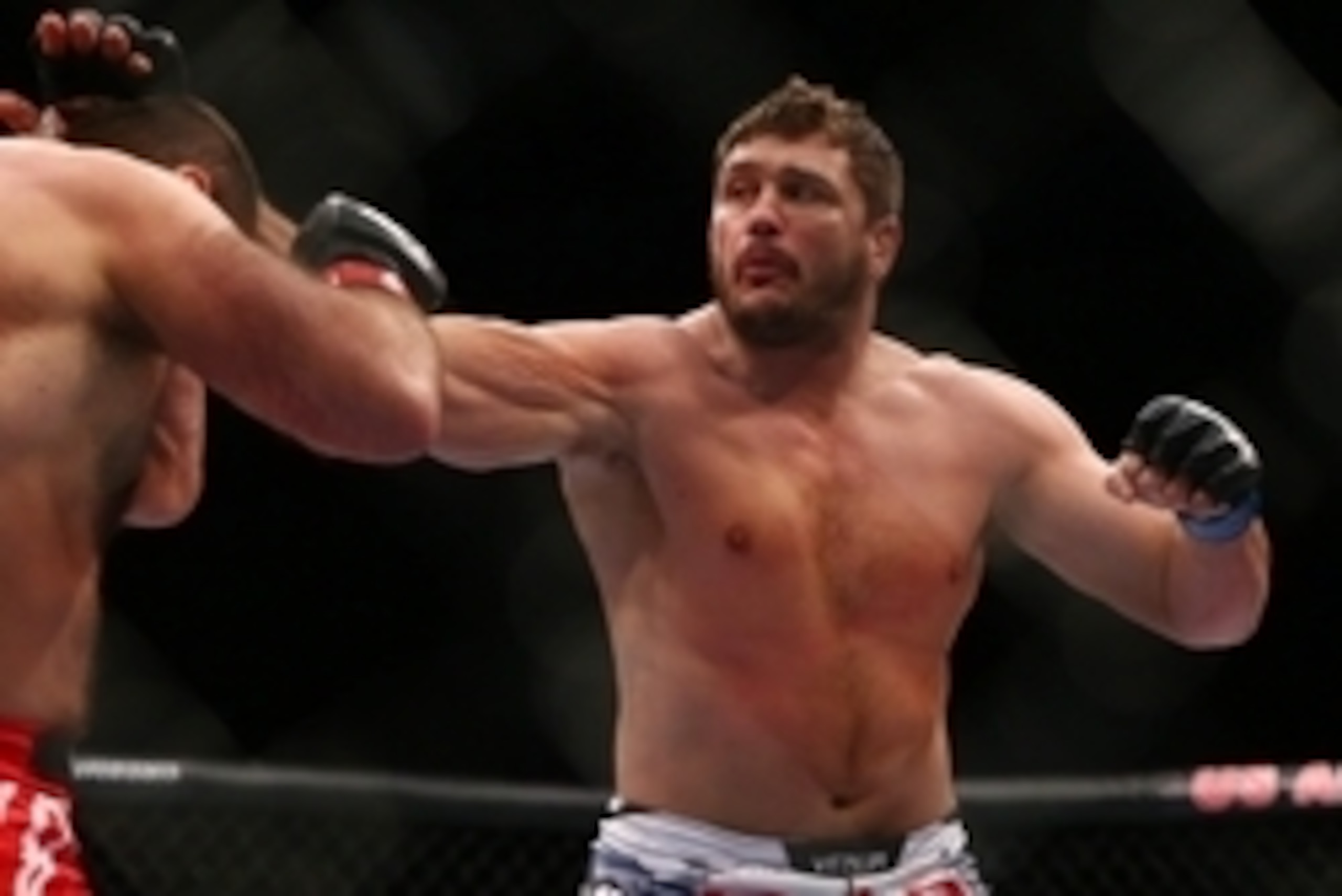 December 13, 2014; Phoenix, AZ, USA; Matt Mitrione hits Gabriel Gonzaga during UFC Fight Night at US Airways Center. Mandatory Credit: Mark J. Rebilas-USA TODAY Sports