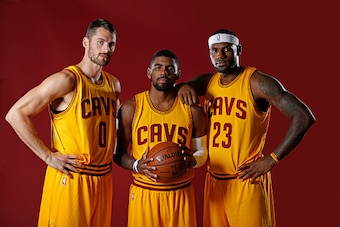 INDEPENDENCE, OH - SEPTEMBER 26:  Kevin Love #0, Kyrie Irving #2 and LeBron James #23 of the Cleveland Cavaliers poses for a photo during media day on September 26, 2014 at the Cleveland Clinic Courts in Independence, Ohio.  NOTE TO USER: User expressly a