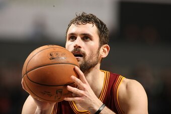CHARLOTTE, NC - JANUARY 2:  Kevin Love #0 of the Cleveland Cavaliers shoots a free throw against the Charlotte Hornets during the game at the Time Warner Cable Arena on January 2, 2015 in Charlotte, North Carolina. NOTE TO USER: User expressly acknowledge
