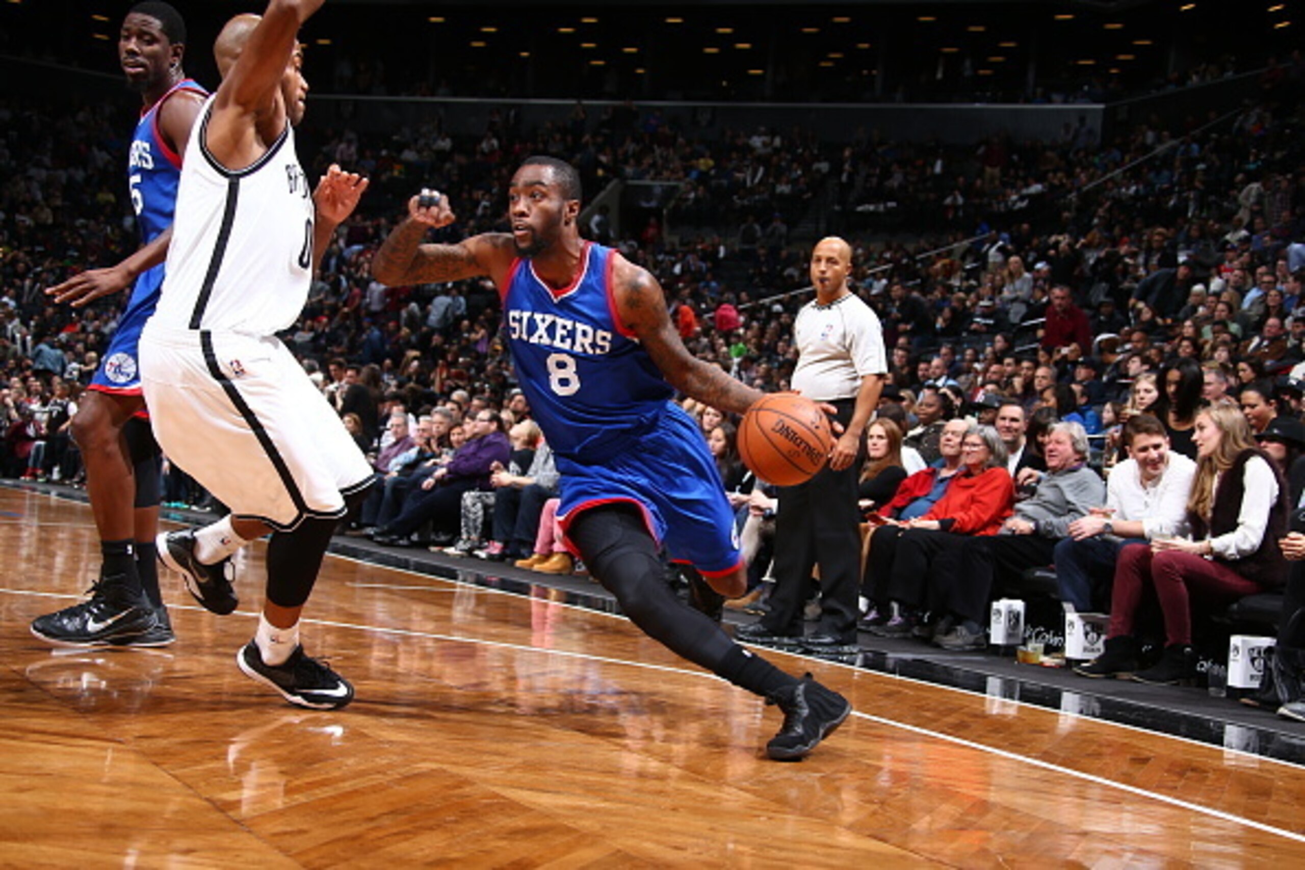 BROOKLYN, NY - DECEMBER 12:  Tony Wroten #8 of the Philadelphia 76ers handles the ball against the Brooklyn Nets during the game on December 12, 2014 at Barclays Center in Brooklyn, New York. NOTE TO USER: User expressly acknowledges and agrees that, by d