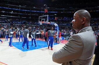 LOS ANGELES, CA - APRIL 6:  Doc Rivers of the Los Angeles Clippers watches his team warm up before the game against the Los Angeles Lakers at Staples Center on April 6, 2014 in Los Angeles, California. NOTE TO USER: User expressly acknowledges and agrees 