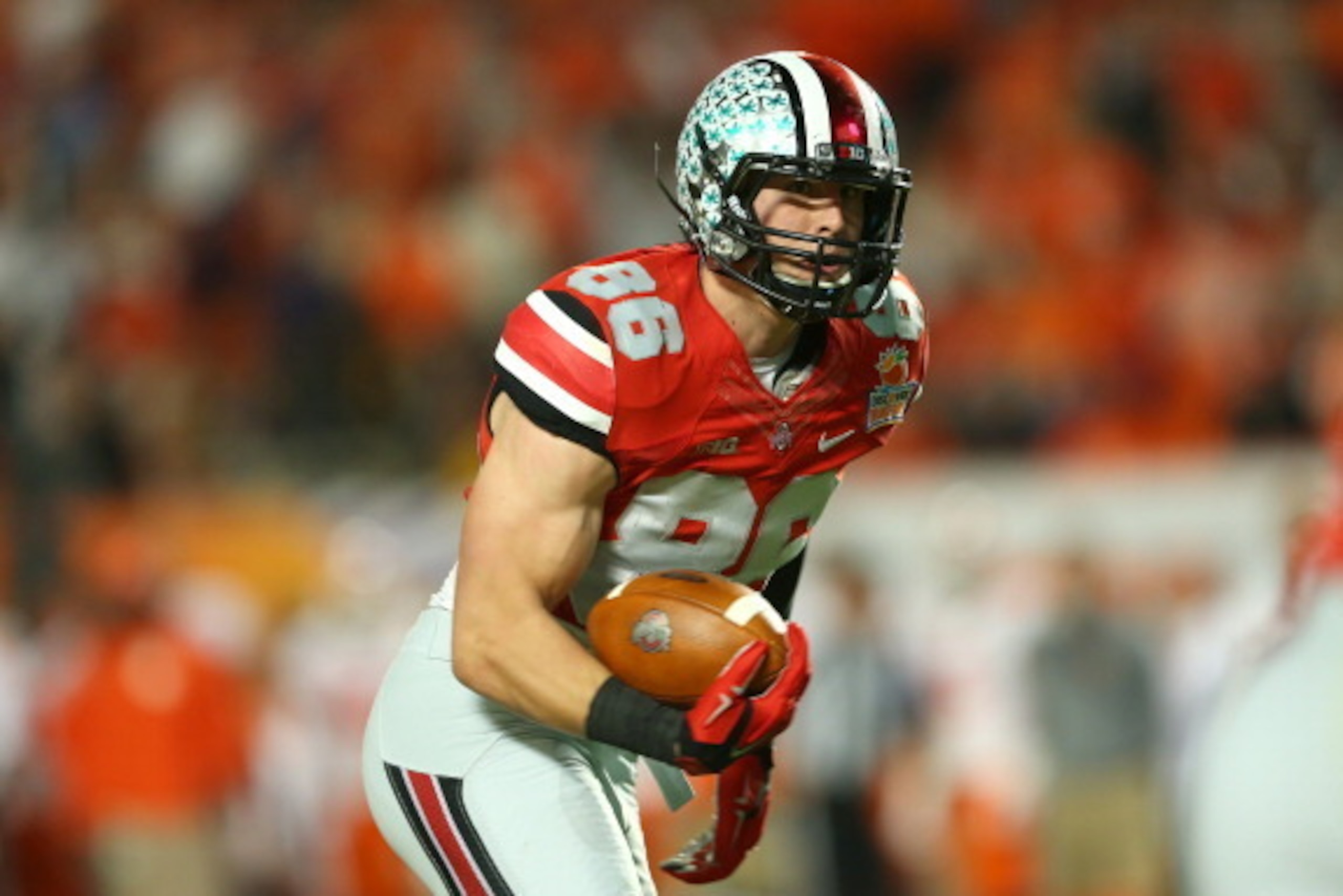 MIAMI GARDENS, FL - JANUARY 03: Jeff Heuerman #86 of the Ohio State Buckeyes runs with the ball for a touchdown in the second quarter against the Clemson Tigers during the Discover Orange Bowl at Sun Life Stadium on January 3, 2014 in Miami Gardens, Flori