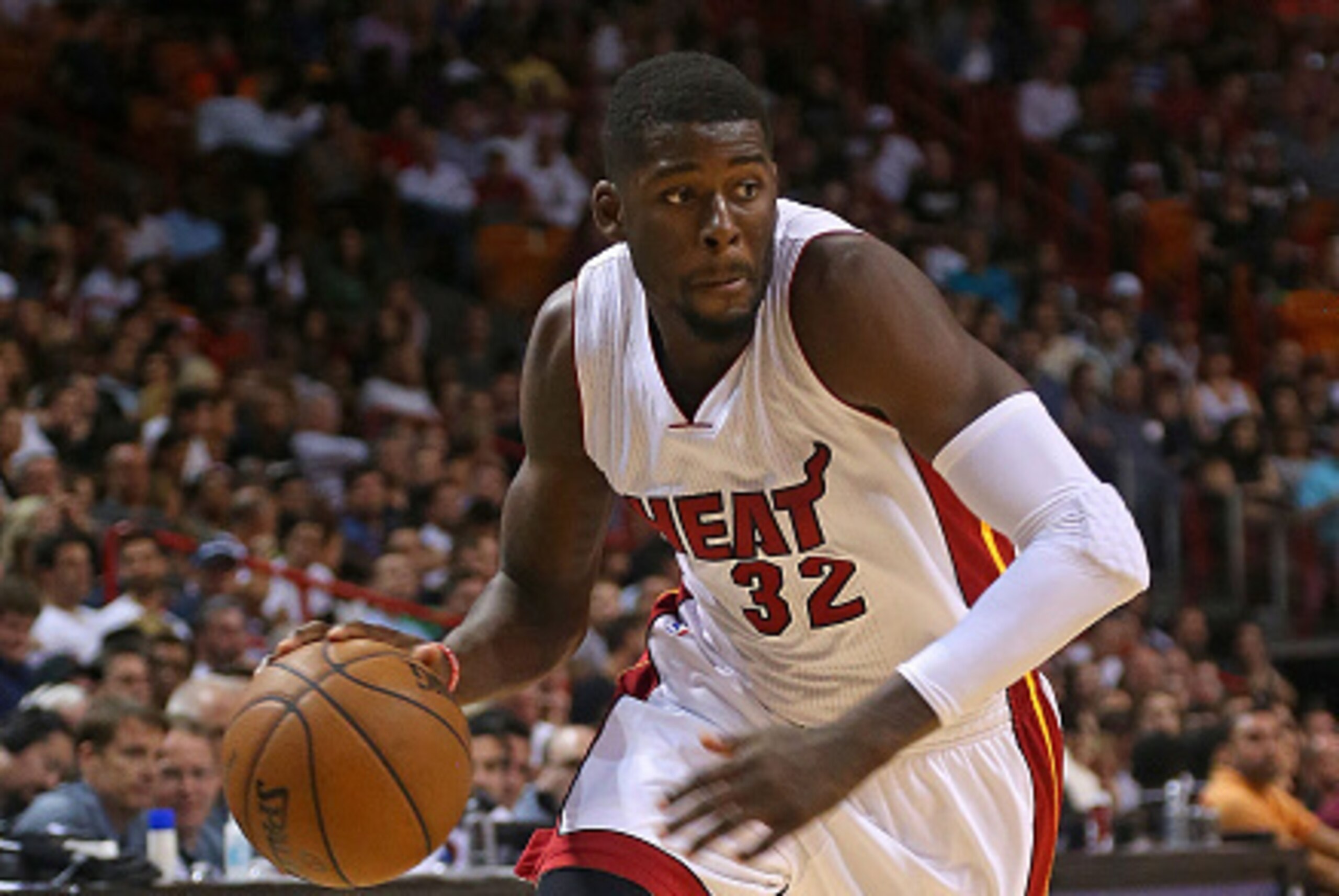 MIAMI, FL - JANUARY 04:  James Ennis #32 of the Miami Heat drives to the basket during a game against the Brooklyn Nets at American Airlines Arena on January 4, 2015 in Miami, Florida. NOTE TO USER: User expressly acknowledges and agrees that, by download