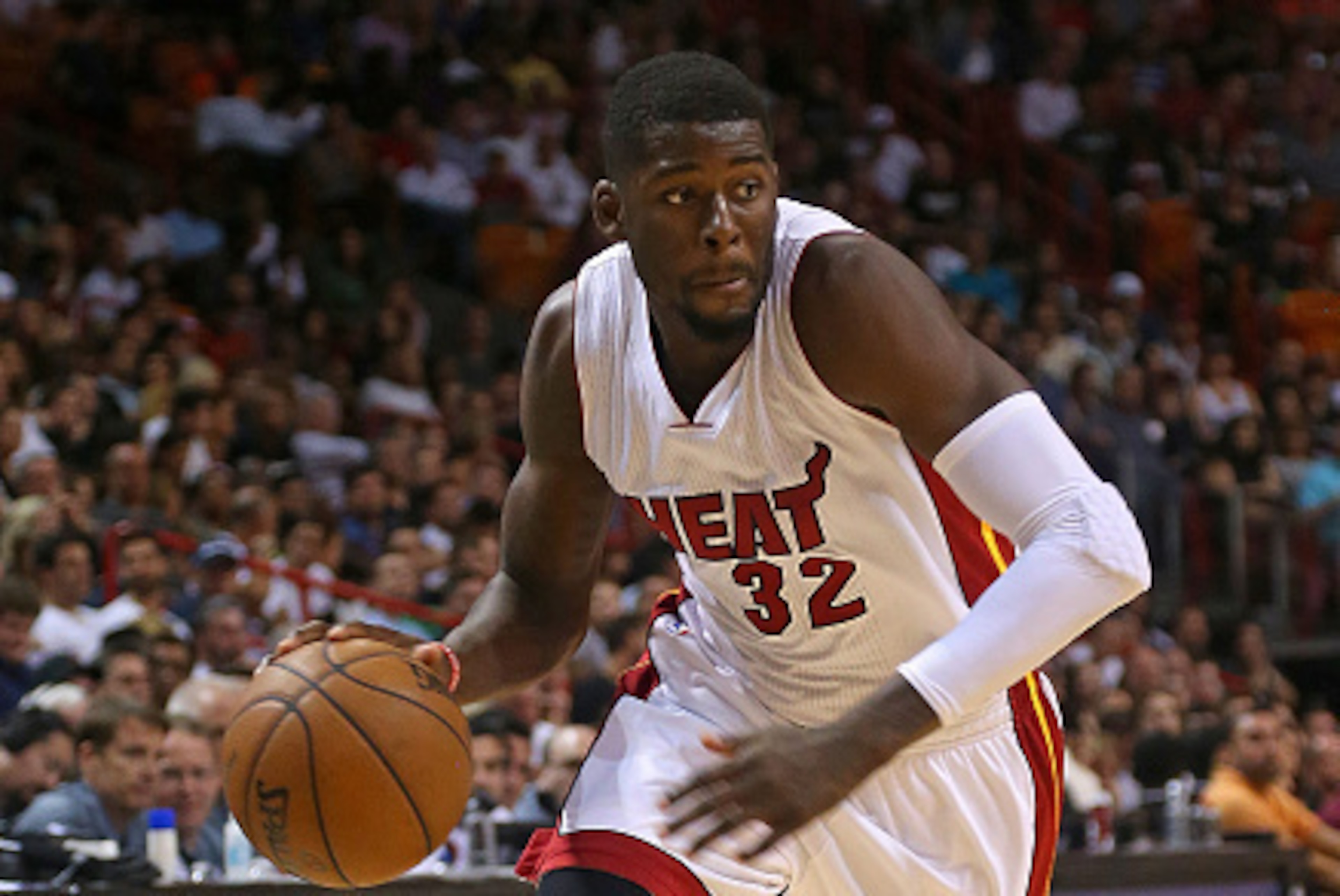 MIAMI, FL - JANUARY 04:  James Ennis #32 of the Miami Heat drives to the basket during a game against the Brooklyn Nets at American Airlines Arena on January 4, 2015 in Miami, Florida. NOTE TO USER: User expressly acknowledges and agrees that, by download