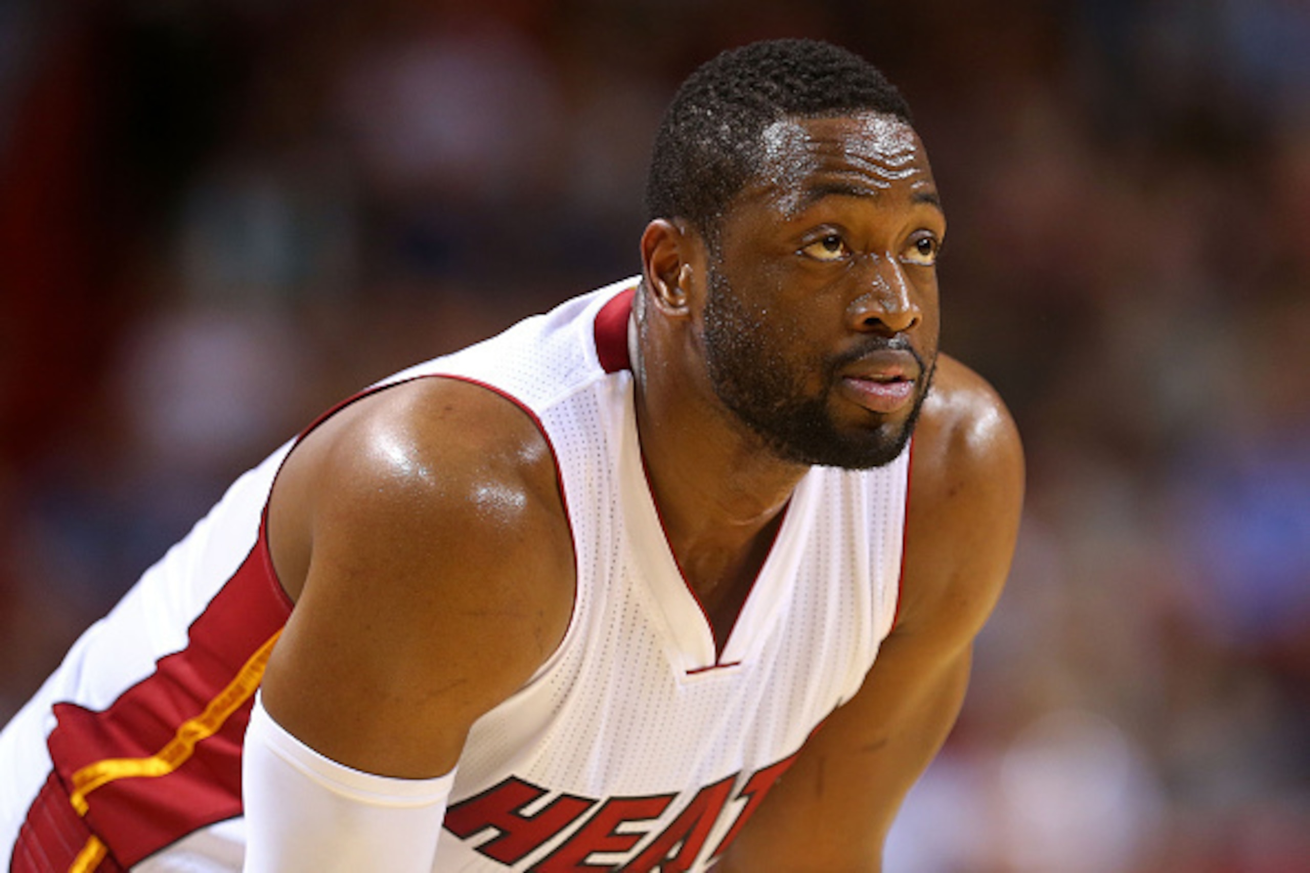 MIAMI, FL - JANUARY 04: Dwyane Wade #3 of the Miami Heat looks on during a game against the Brooklyn Nets at American Airlines Arena on January 4, 2015 in Miami, Florida. NOTE TO USER: User expressly acknowledges and agrees that, by downloading and/or usi