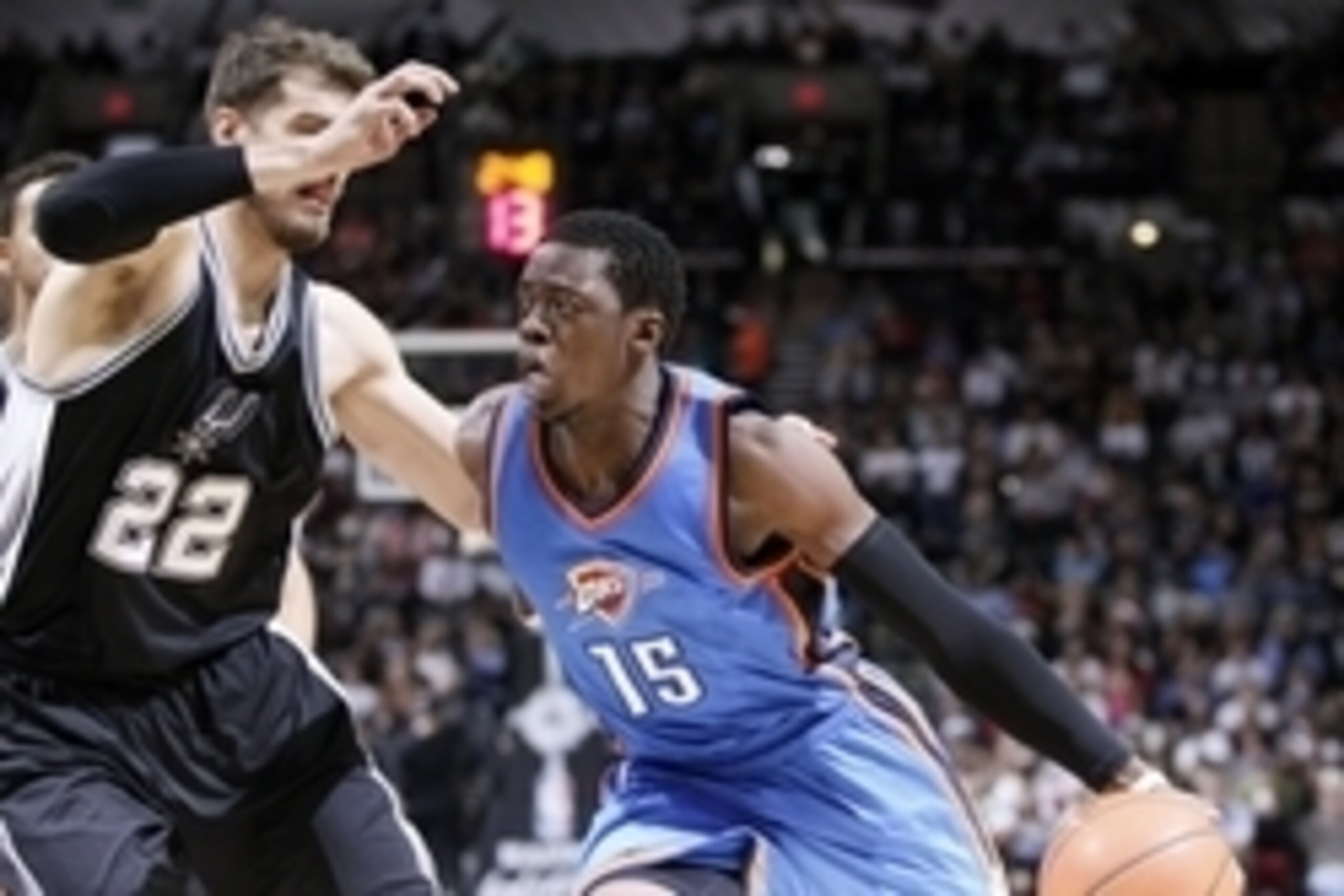 Dec 25, 2014; San Antonio, TX, USA; Oklahoma City Thunder point guard Reggie Jackson (15) drives to the basket while guarded by San Antonio Spurs power forward Tiago Splitter (22) during the second half at AT&T Center. Mandatory Credit: Soobum Im-USA TODA