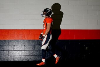 DENVER, CO - DECEMBER 7:  Wide receiver Wes Welker #83 of the Denver Broncos walks in the tunnel before a game against the Buffalo Bills at Sports Authority Field Field at Mile High on December 7, 2014 in Denver, Colorado. (Photo by Justin Edmonds/Getty I
