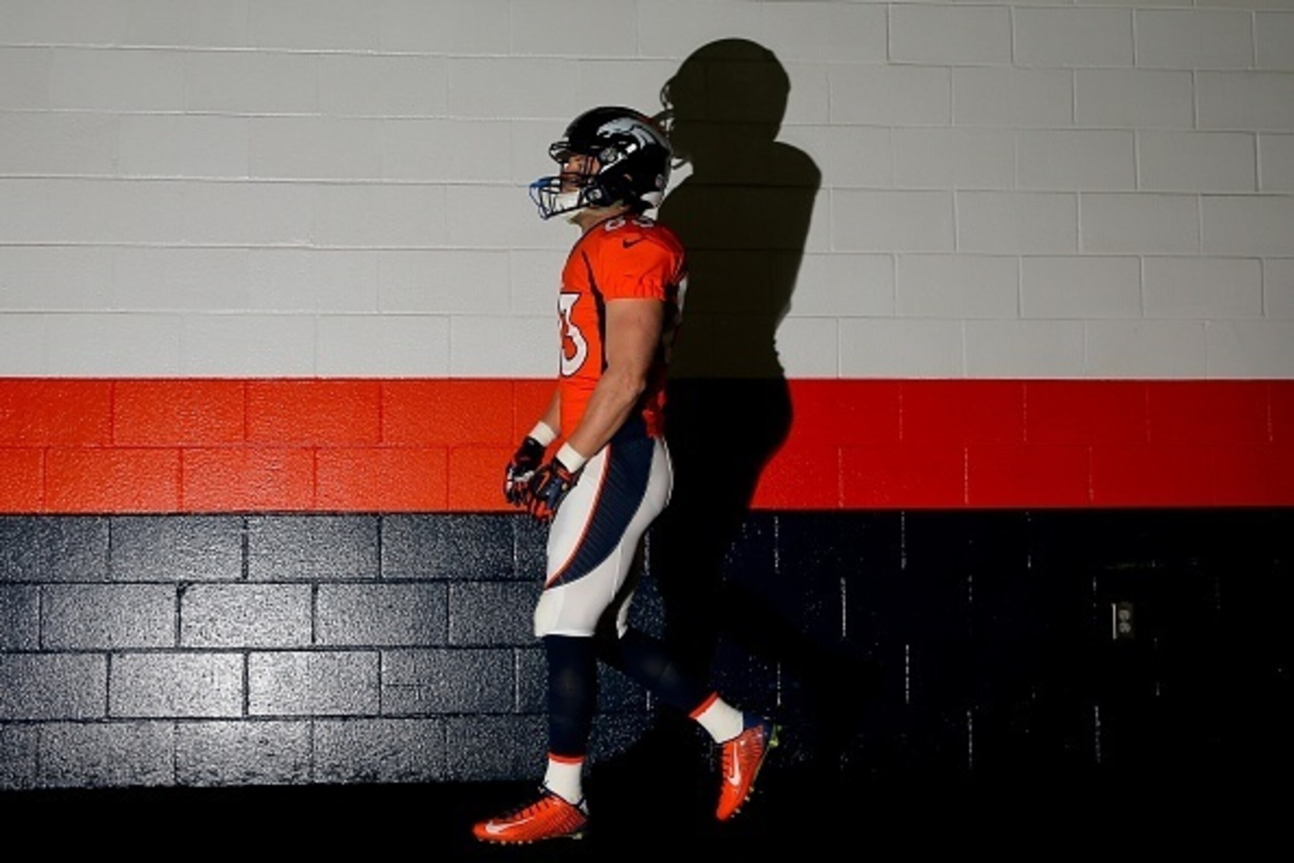 DENVER, CO - DECEMBER 7:  Wide receiver Wes Welker #83 of the Denver Broncos walks in the tunnel before a game against the Buffalo Bills at Sports Authority Field Field at Mile High on December 7, 2014 in Denver, Colorado. (Photo by Justin Edmonds/Getty I