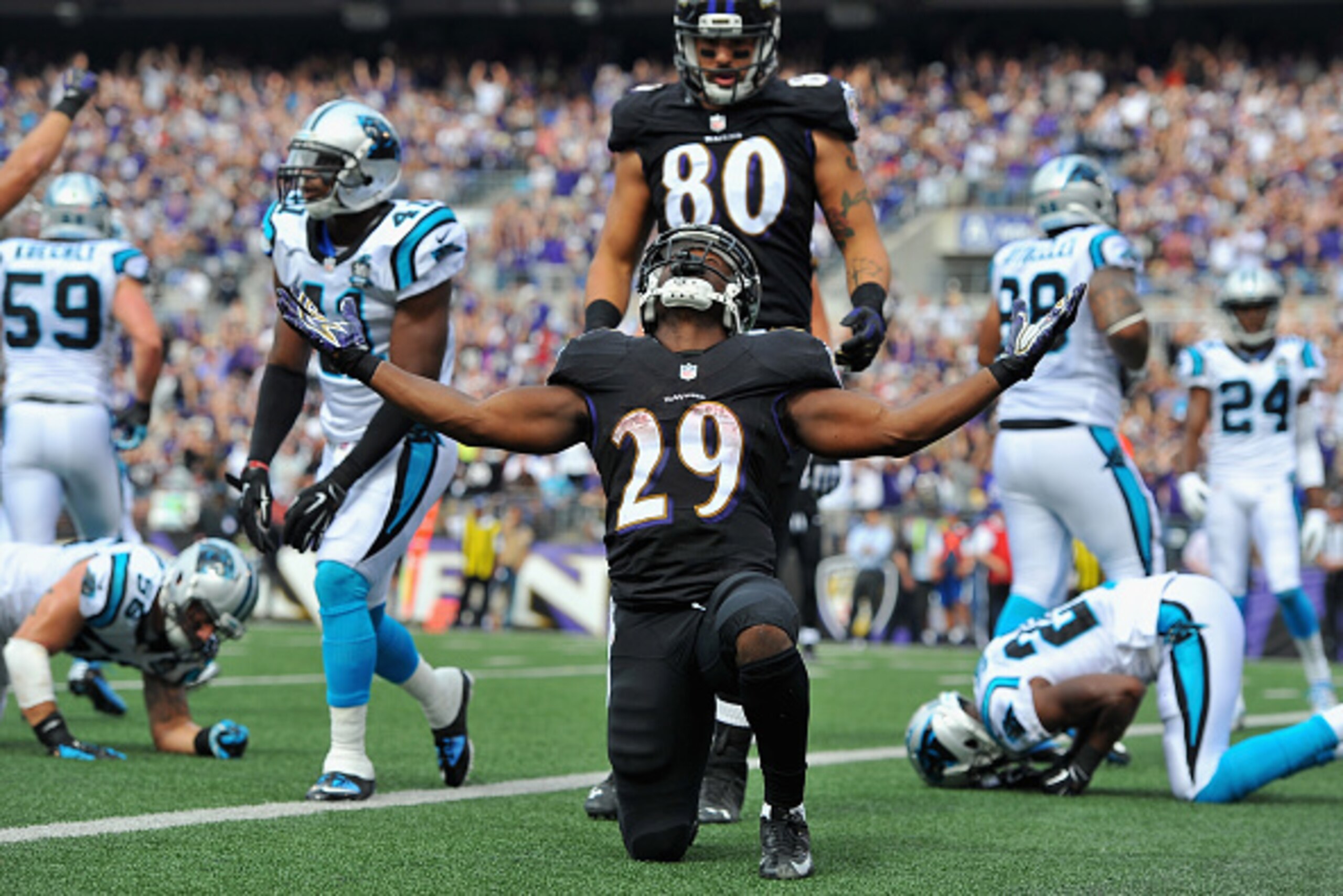 BALTIMORE, MD - SEPTEMBER 28: Running back Justin Forsett #29 of the Baltimore Ravens celebrates after scoring a second quarter touchdown against the Carolina Panthers at M&T Bank Stadium on September 28, 2014 in Baltimore, Maryland.  (Photo by Larry Fren