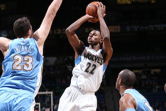 MINNEAPOLIS, MN -  JANUARY 5: Andrew Wiggins #22 of the Minnesota Timberwolves shoots against the Denver Nuggets during the game on January 5, 2015 at Target Center in Minneapolis, Minnesota. NOTE TO USER: User expressly acknowledges and agrees that, by d